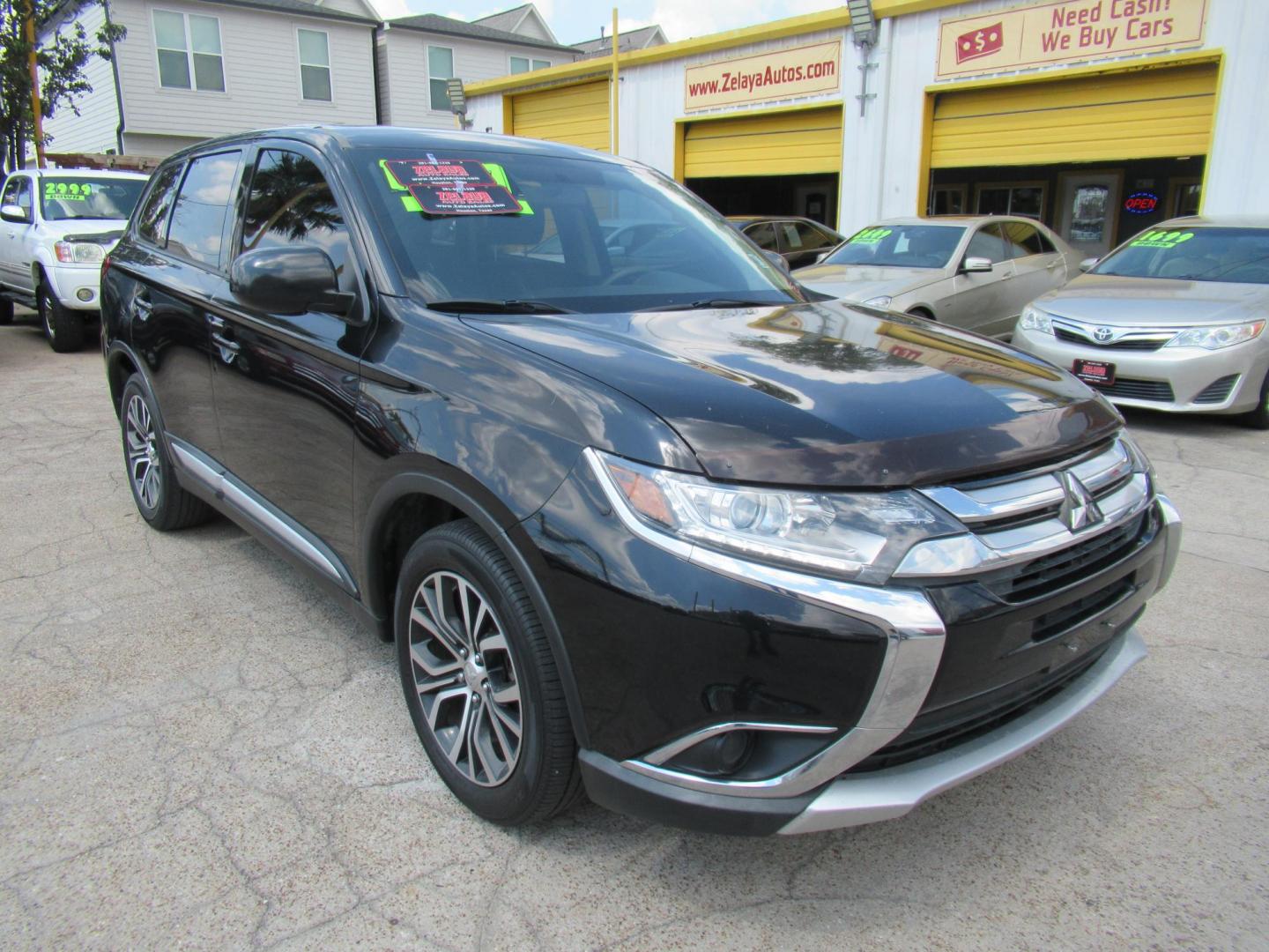 2018 Black /Black Mitsubishi Outlander ES 2WD (JA4AD2A33JZ) with an 2.4L L4 DOHC 16V engine, CVT transmission, located at 1511 North Shepherd Dr., Houston, TX, 77008, (281) 657-1221, 29.798361, -95.412560 - 2018 Mitsubishi Outlander ES 2WDES 2WDES 2WDES 2WD SUV 4-DR 2.4L L4 DOHC 16V - Photo#22