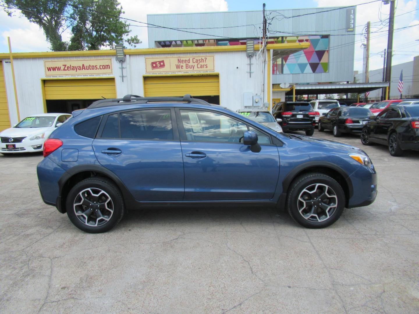 2013 Blue /Gray Subaru XV Crosstrek 2.0 Premium (JF2GPAVC4D2) with an 2.0L L4 DOHC 16V engine, Continuously Variable Transmission transmission, located at 1511 North Shepherd Dr., Houston, TX, 77008, (281) 657-1221, 29.798361, -95.412560 - 2013 Subaru XV Crosstrek 2.0 Premium SUV 4-DR 2.0L L4 DOHC 16V - Photo#18