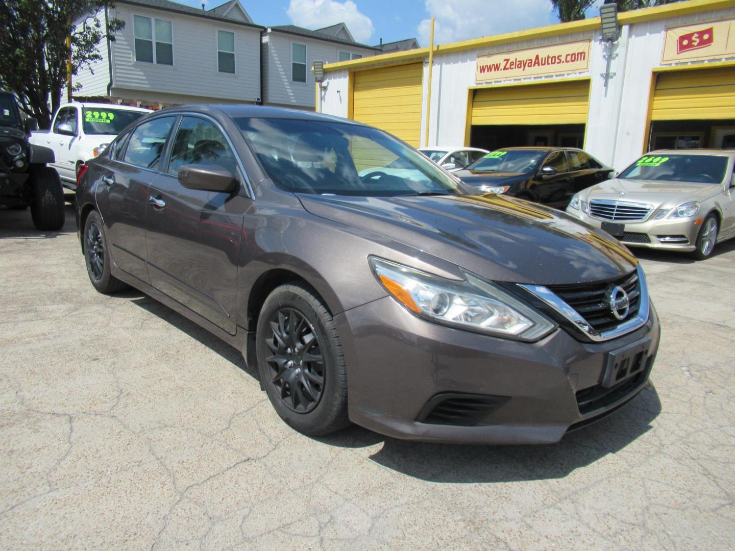 2017 Brown /Black Nissan Altima 2.5 S (1N4AL3AP5HC) with an 2.5L L4 DOHC 16V engine, CVT transmission, located at 1511 North Shepherd Dr., Houston, TX, 77008, (281) 657-1221, 29.798361, -95.412560 - 2017 Nissan Altima 2.5 S SEDAN 4-DR 2.5L L4 DOHC 16V - Photo#18