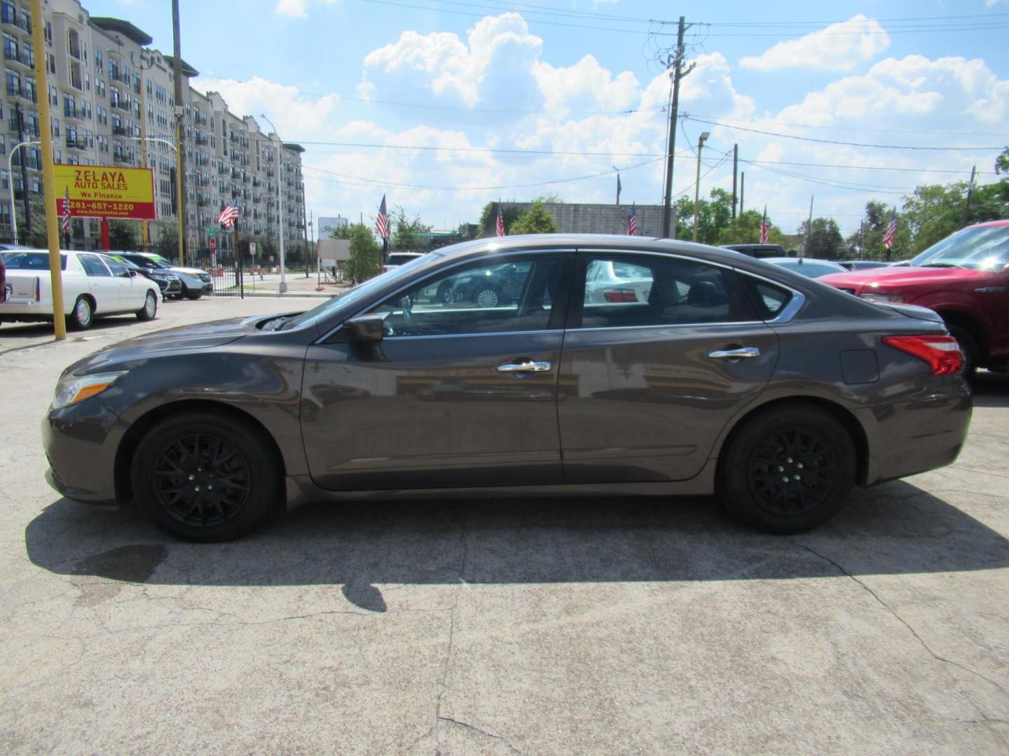 2017 Brown /Black Nissan Altima 2.5 S (1N4AL3AP5HC) with an 2.5L L4 DOHC 16V engine, CVT transmission, located at 1511 North Shepherd Dr., Houston, TX, 77008, (281) 657-1221, 29.798361, -95.412560 - 2017 Nissan Altima 2.5 S SEDAN 4-DR 2.5L L4 DOHC 16V - Photo#22