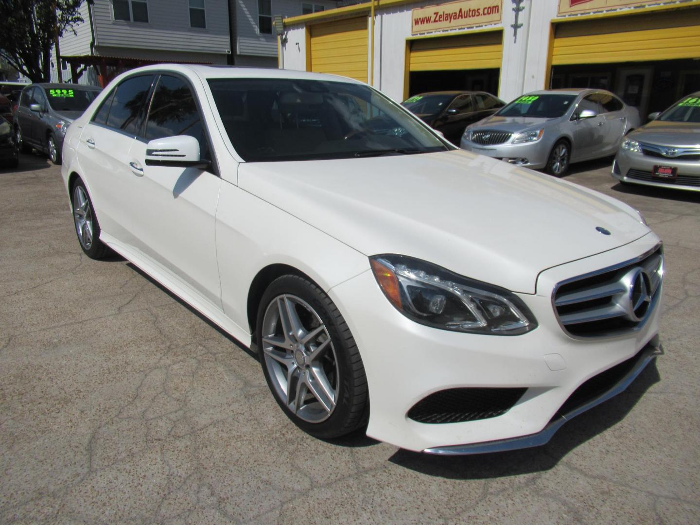 2014 White /Tan Mercedes-Benz E-Class E350 Sedan (WDDHF5KB0EB) with an 3.5L V6 DOHC 24V engine, Automatic transmission, located at 1511 North Shepherd Dr., Houston, TX, 77008, (281) 657-1221, 29.798361, -95.412560 - 2014 MERCEDES-BENZ E-CLASS E 350 SPORT VIN: WDDHF5KB0EB009666 W D D H F 5 K B 0 E B 0 0 9 6 6 6 SEDAN 4 DR 3.5L V6 F DOHC 24V GASOLINE REAR WHEEL DRIVE - Photo#22