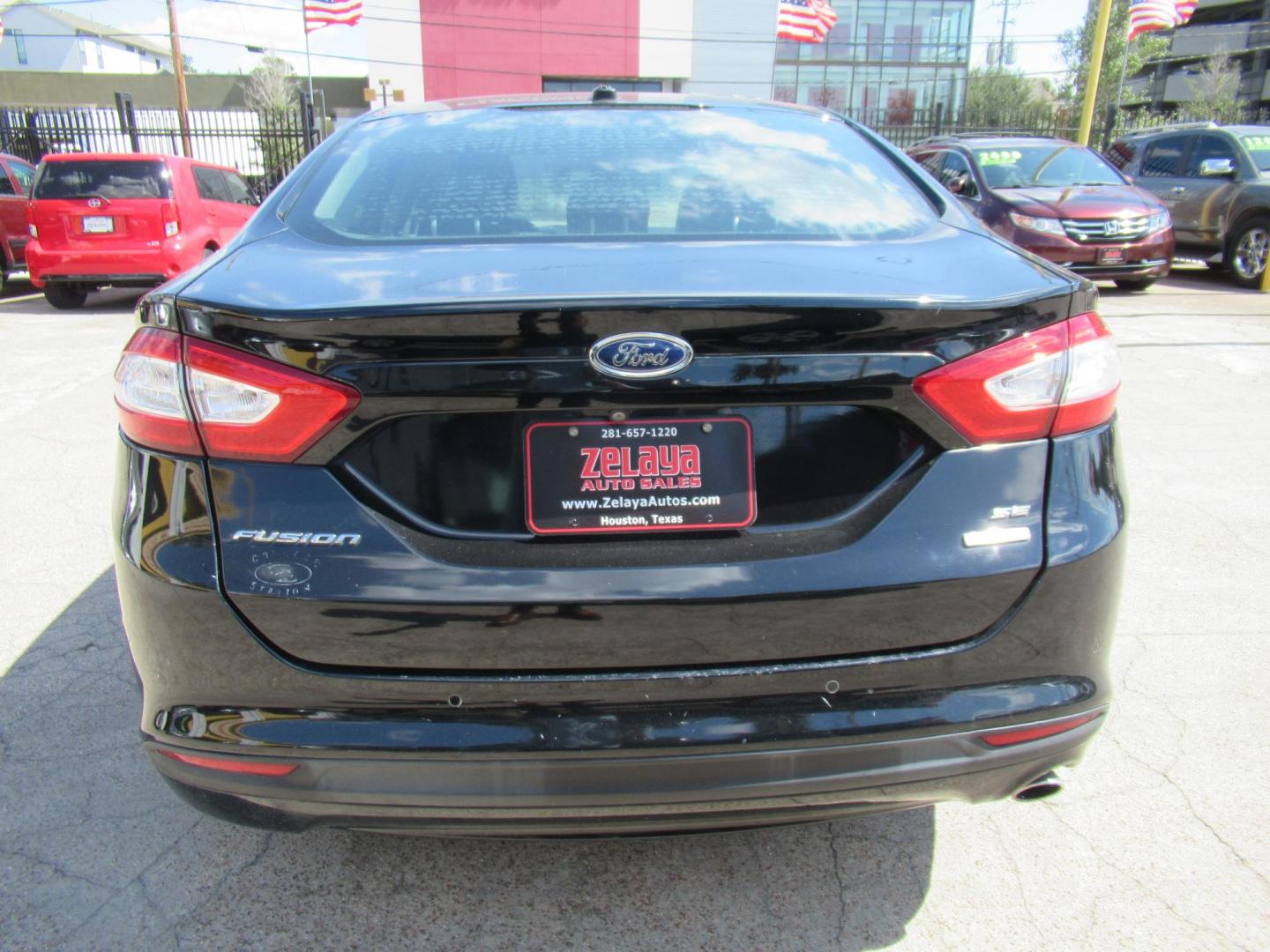 2016 Black /Black Ford Fusion SE (3FA6P0HD2GR) with an 1.5L L4 DOHC 16V engine, Automatic transmission, located at 1511 North Shepherd Dr., Houston, TX, 77008, (281) 657-1221, 29.798361, -95.412560 - 2016 FORD FUSION SE VIN: 3FA6P0HD2GR193264 3 F A 6 P 0 H D 2 G R 1 9 3 2 6 4 SEDAN 4 DR 1.5L I4 F DOHC 16V GASOLINE FRONT WHEEL DRIVE - Photo#20