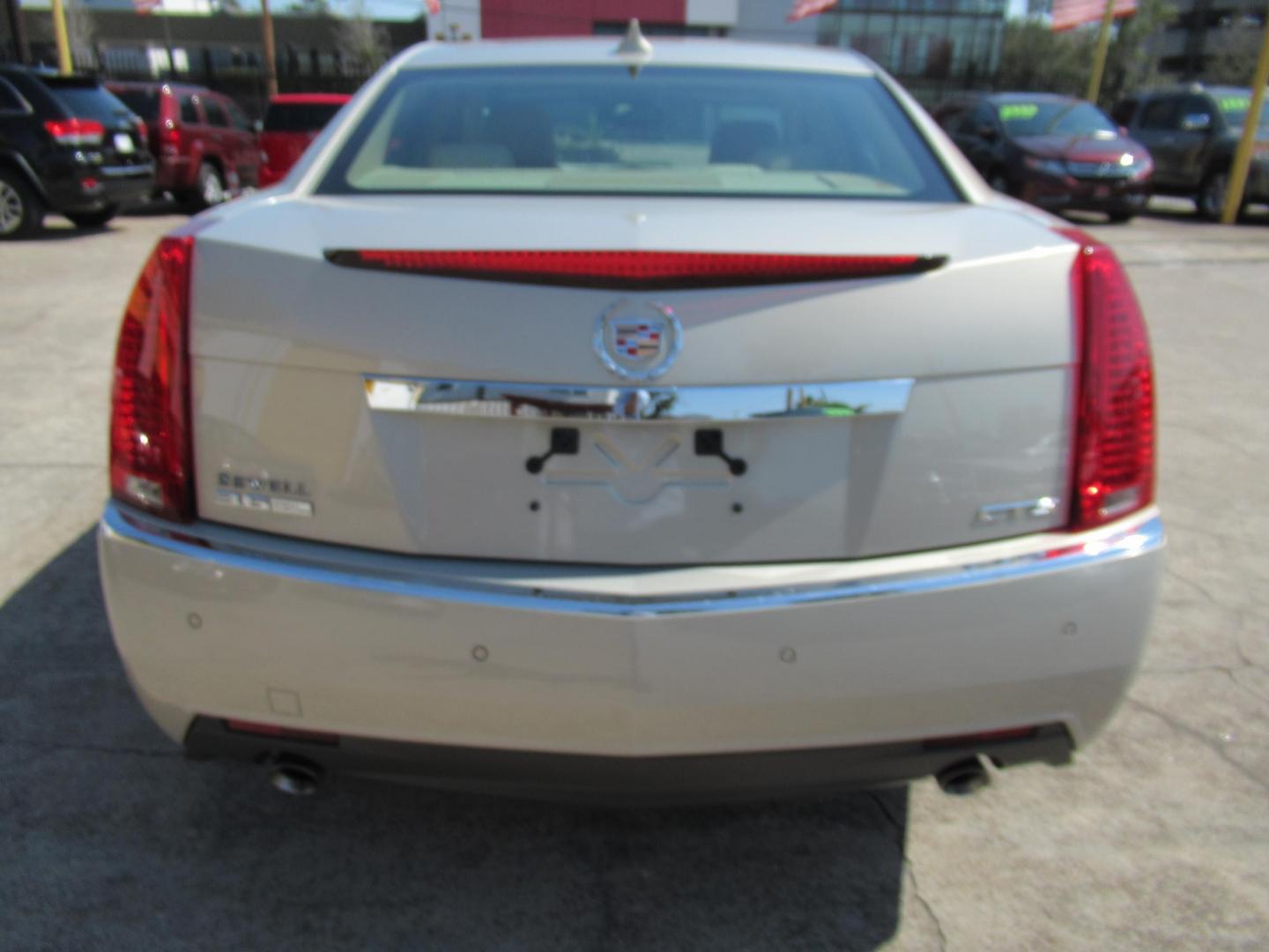 2009 /Tan Cadillac CTS 3.6L SIDI with Navigation (1G6DV57V090) with an 3.6L V6 DOHC 24V engine, Automatic transmission, located at 1511 North Shepherd Dr., Houston, TX, 77008, (281) 657-1221, 29.798361, -95.412560 - VIN: 1G6DV57V090128899 1 G 6 D V 5 7 V 0 9 0 1 2 8 8 9 9 SEDAN 4 DR 3.6L V6 F DOHC 24V GASOLINE REAR WHEEL DRIVE - Photo#16