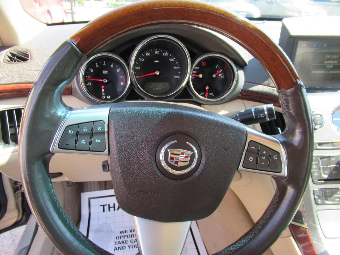 2009 /Tan Cadillac CTS 3.6L SIDI with Navigation (1G6DV57V090) with an 3.6L V6 DOHC 24V engine, Automatic transmission, located at 1511 North Shepherd Dr., Houston, TX, 77008, (281) 657-1221, 29.798361, -95.412560 - VIN: 1G6DV57V090128899 1 G 6 D V 5 7 V 0 9 0 1 2 8 8 9 9 SEDAN 4 DR 3.6L V6 F DOHC 24V GASOLINE REAR WHEEL DRIVE - Photo#3