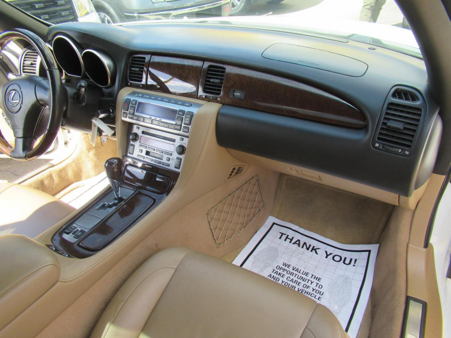 2006 White /Tan Lexus SC 430 Convertible (JTHFN48Y469) with an 4.3L V8 DOHC 32V engine, Automatic Overdrive transmission, located at 1511 North Shepherd Dr., Houston, TX, 77008, (281) 657-1221, 29.798361, -95.412560 - 2006 LEXUS SC 430 VIN: JTHFN48Y469004147 J T H F N 4 8 Y 4 6 9 0 0 4 1 4 7 CONVERTIBLE 4.3L V8 F DOHC 32V GASOLINE REAR WHEEL DRIVE - Photo#10