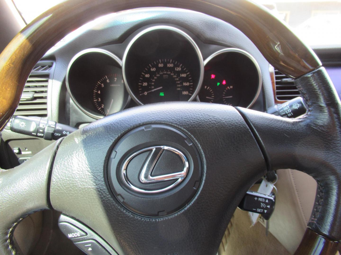 2006 White /Tan Lexus SC 430 Convertible (JTHFN48Y469) with an 4.3L V8 DOHC 32V engine, Automatic Overdrive transmission, located at 1511 North Shepherd Dr., Houston, TX, 77008, (281) 657-1221, 29.798361, -95.412560 - 2006 LEXUS SC 430 VIN: JTHFN48Y469004147 J T H F N 4 8 Y 4 6 9 0 0 4 1 4 7 CONVERTIBLE 4.3L V8 F DOHC 32V GASOLINE REAR WHEEL DRIVE - Photo#12