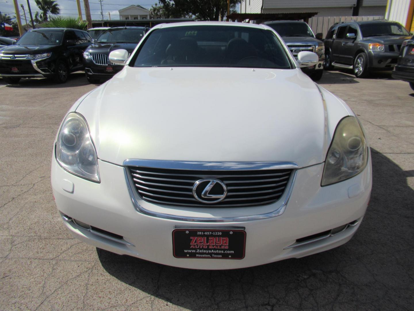 2006 White /Tan Lexus SC 430 Convertible (JTHFN48Y469) with an 4.3L V8 DOHC 32V engine, Automatic Overdrive transmission, located at 1511 North Shepherd Dr., Houston, TX, 77008, (281) 657-1221, 29.798361, -95.412560 - 2006 LEXUS SC 430 VIN: JTHFN48Y469004147 J T H F N 4 8 Y 4 6 9 0 0 4 1 4 7 CONVERTIBLE 4.3L V8 F DOHC 32V GASOLINE REAR WHEEL DRIVE - Photo#22