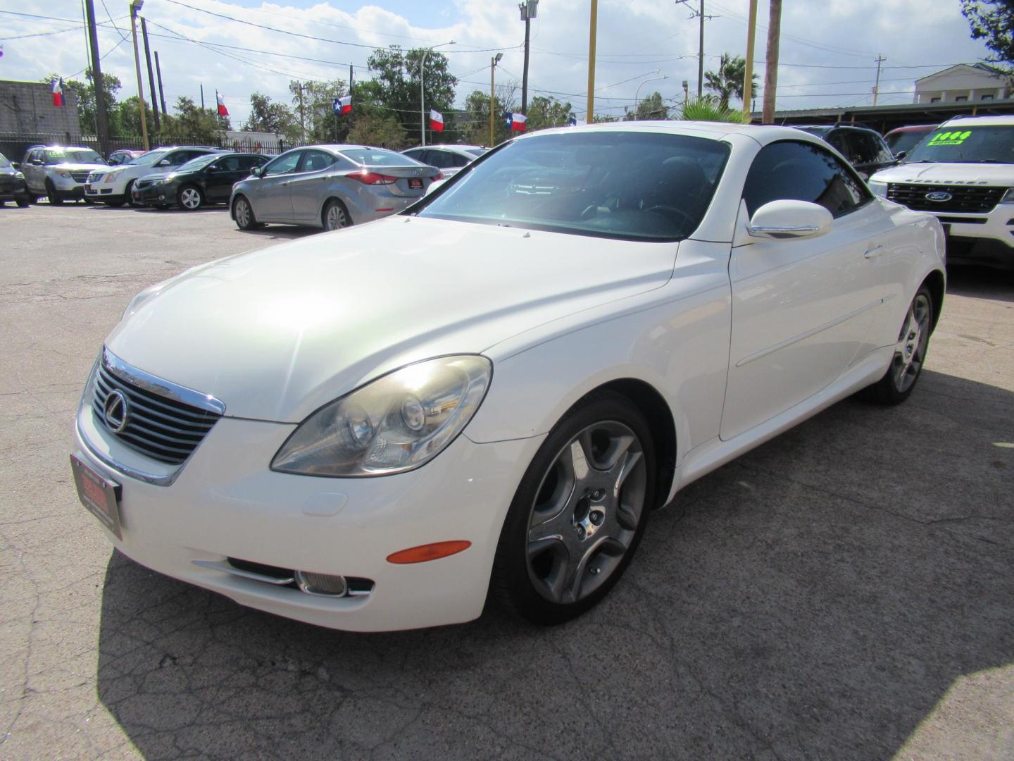 2006 White /Tan Lexus SC 430 Convertible (JTHFN48Y469) with an 4.3L V8 DOHC 32V engine, Automatic Overdrive transmission, located at 1511 North Shepherd Dr., Houston, TX, 77008, (281) 657-1221, 29.798361, -95.412560 - 2006 LEXUS SC 430 VIN: JTHFN48Y469004147 J T H F N 4 8 Y 4 6 9 0 0 4 1 4 7 CONVERTIBLE 4.3L V8 F DOHC 32V GASOLINE REAR WHEEL DRIVE - Photo#23