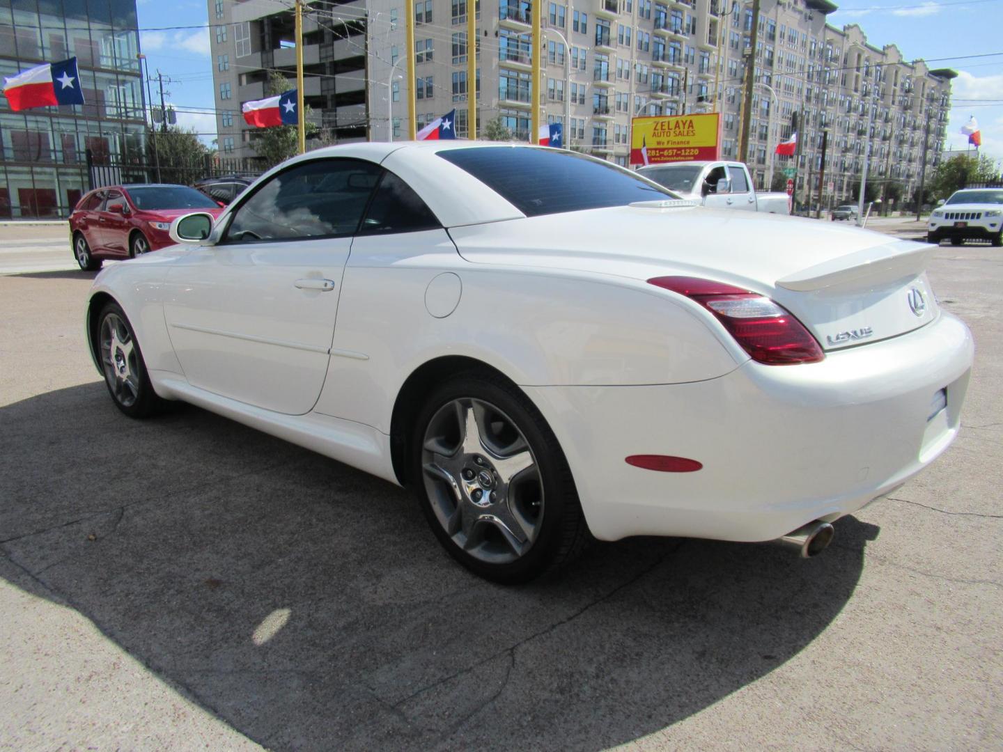 2006 White /Tan Lexus SC 430 Convertible (JTHFN48Y469) with an 4.3L V8 DOHC 32V engine, Automatic Overdrive transmission, located at 1511 North Shepherd Dr., Houston, TX, 77008, (281) 657-1221, 29.798361, -95.412560 - 2006 LEXUS SC 430 VIN: JTHFN48Y469004147 J T H F N 4 8 Y 4 6 9 0 0 4 1 4 7 CONVERTIBLE 4.3L V8 F DOHC 32V GASOLINE REAR WHEEL DRIVE - Photo#24