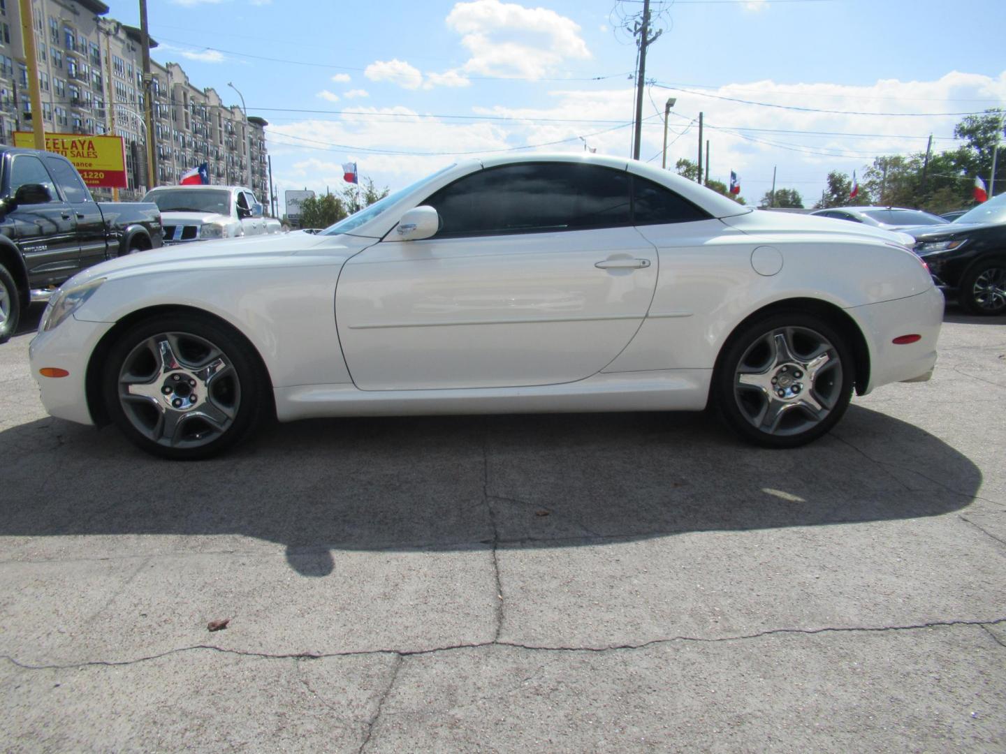 2006 White /Tan Lexus SC 430 Convertible (JTHFN48Y469) with an 4.3L V8 DOHC 32V engine, Automatic Overdrive transmission, located at 1511 North Shepherd Dr., Houston, TX, 77008, (281) 657-1221, 29.798361, -95.412560 - 2006 LEXUS SC 430 VIN: JTHFN48Y469004147 J T H F N 4 8 Y 4 6 9 0 0 4 1 4 7 CONVERTIBLE 4.3L V8 F DOHC 32V GASOLINE REAR WHEEL DRIVE - Photo#26