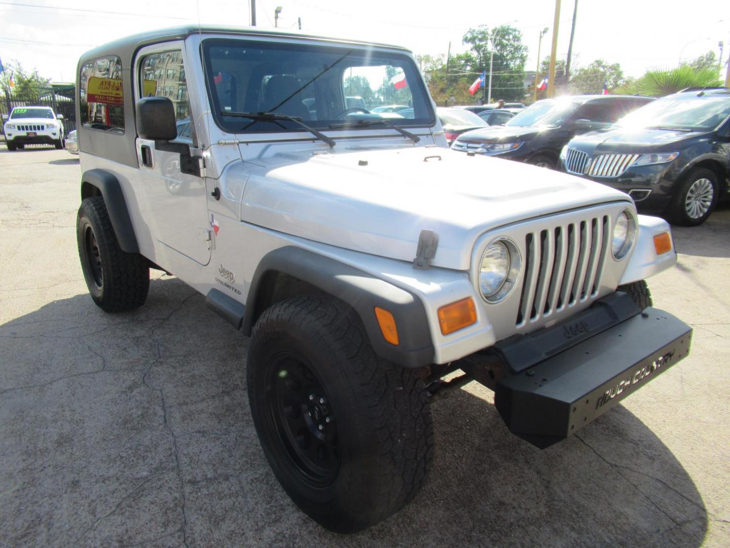 2005 Silver /Black Jeep Wrangler Unlimited (1J4FA44S65P) with an 4.0L L6 OHV 12V engine, located at 1511 North Shepherd Dr., Houston, TX, 77008, (281) 657-1221, 29.798361, -95.412560 - 2005 JEEP WRANGLER UNLIMITED VIN: 1J4FA44S65P359534 1 J 4 F A 4 4 S 6 5 P 3 5 9 5 3 4 UTILITY (BLAZER, JIMMY, SCOUT, ETC.) 4.0L I6 F GASOLINE REAR WHEEL DRIVE W/ 4X4 - Photo#11