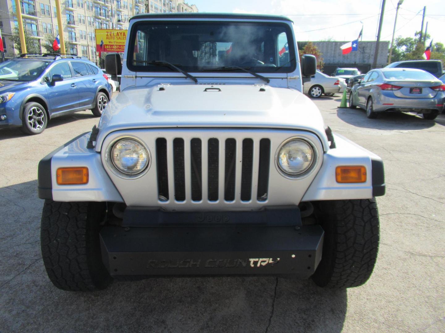 2005 Silver /Black Jeep Wrangler Unlimited (1J4FA44S65P) with an 4.0L L6 OHV 12V engine, located at 1511 North Shepherd Dr., Houston, TX, 77008, (281) 657-1221, 29.798361, -95.412560 - 2005 JEEP WRANGLER UNLIMITED VIN: 1J4FA44S65P359534 1 J 4 F A 4 4 S 6 5 P 3 5 9 5 3 4 UTILITY (BLAZER, JIMMY, SCOUT, ETC.) 4.0L I6 F GASOLINE REAR WHEEL DRIVE W/ 4X4 - Photo#12