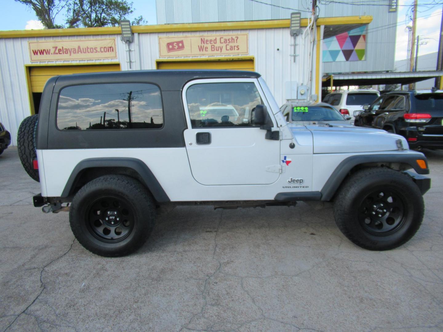 2005 Silver /Black Jeep Wrangler Unlimited (1J4FA44S65P) with an 4.0L L6 OHV 12V engine, located at 1511 North Shepherd Dr., Houston, TX, 77008, (281) 657-1221, 29.798361, -95.412560 - 2005 JEEP WRANGLER UNLIMITED VIN: 1J4FA44S65P359534 1 J 4 F A 4 4 S 6 5 P 3 5 9 5 3 4 UTILITY (BLAZER, JIMMY, SCOUT, ETC.) 4.0L I6 F GASOLINE REAR WHEEL DRIVE W/ 4X4 - Photo#29