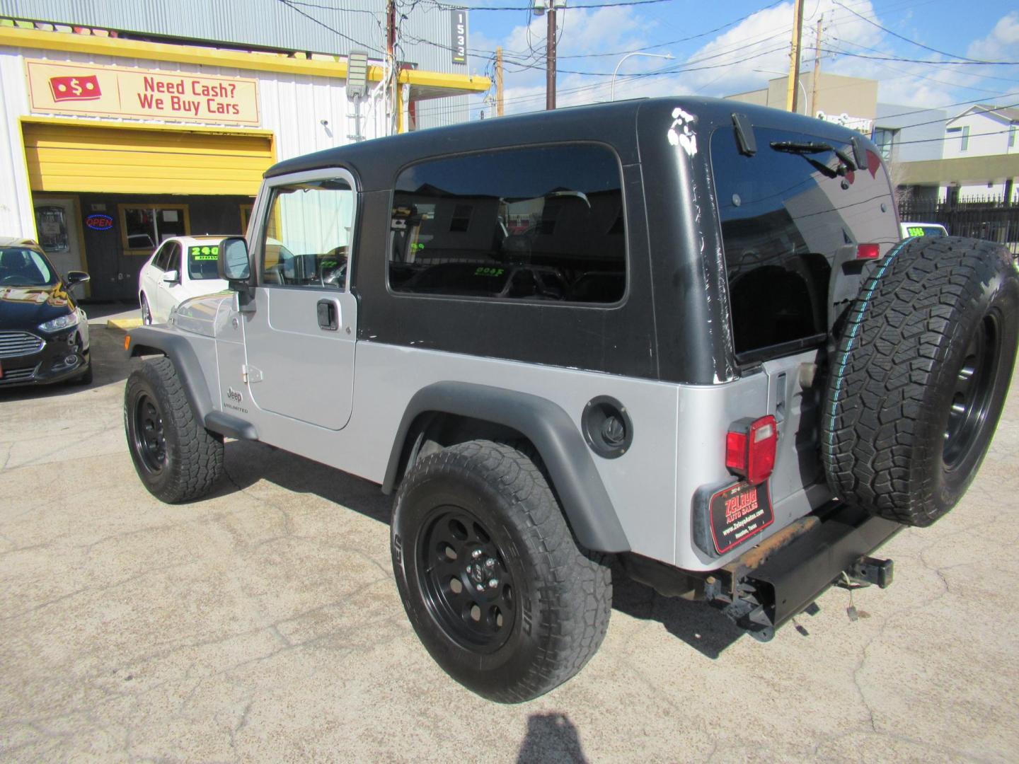 2005 Silver /Black Jeep Wrangler Unlimited (1J4FA44S65P) with an 4.0L L6 OHV 12V engine, located at 1511 North Shepherd Dr., Houston, TX, 77008, (281) 657-1221, 29.798361, -95.412560 - 2005 JEEP WRANGLER UNLIMITED VIN: 1J4FA44S65P359534 1 J 4 F A 4 4 S 6 5 P 3 5 9 5 3 4 UTILITY (BLAZER, JIMMY, SCOUT, ETC.) 4.0L I6 F GASOLINE REAR WHEEL DRIVE W/ 4X4 - Photo#9