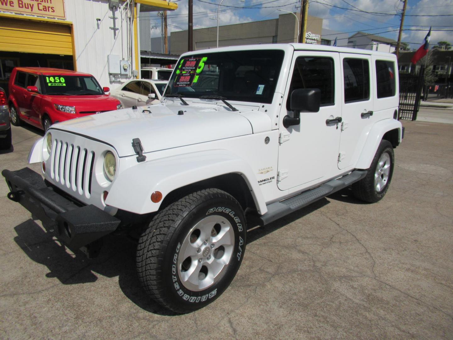 2013 White /Brown Jeep Wrangler Unlimited Sahara 4WD (1C4HJWEG7DL) with an 3.6L V6 DOHC 24V FFV engine, Automatic transmission, located at 1511 North Shepherd Dr., Houston, TX, 77008, (281) 657-1221, 29.798361, -95.412560 - 2013 JEEP WRANGLER UNLIMITED SAHARA VIN: 1C4HJWEG7DL579209 1 C 4 H J W E G 7 D L 5 7 9 2 0 9 4 DOOR WAGON/SPORT UTILITY 3.6L V6 F DOHC 24V GASOLINE REAR WHEEL DRIVE W/ 4X4 - Photo#8