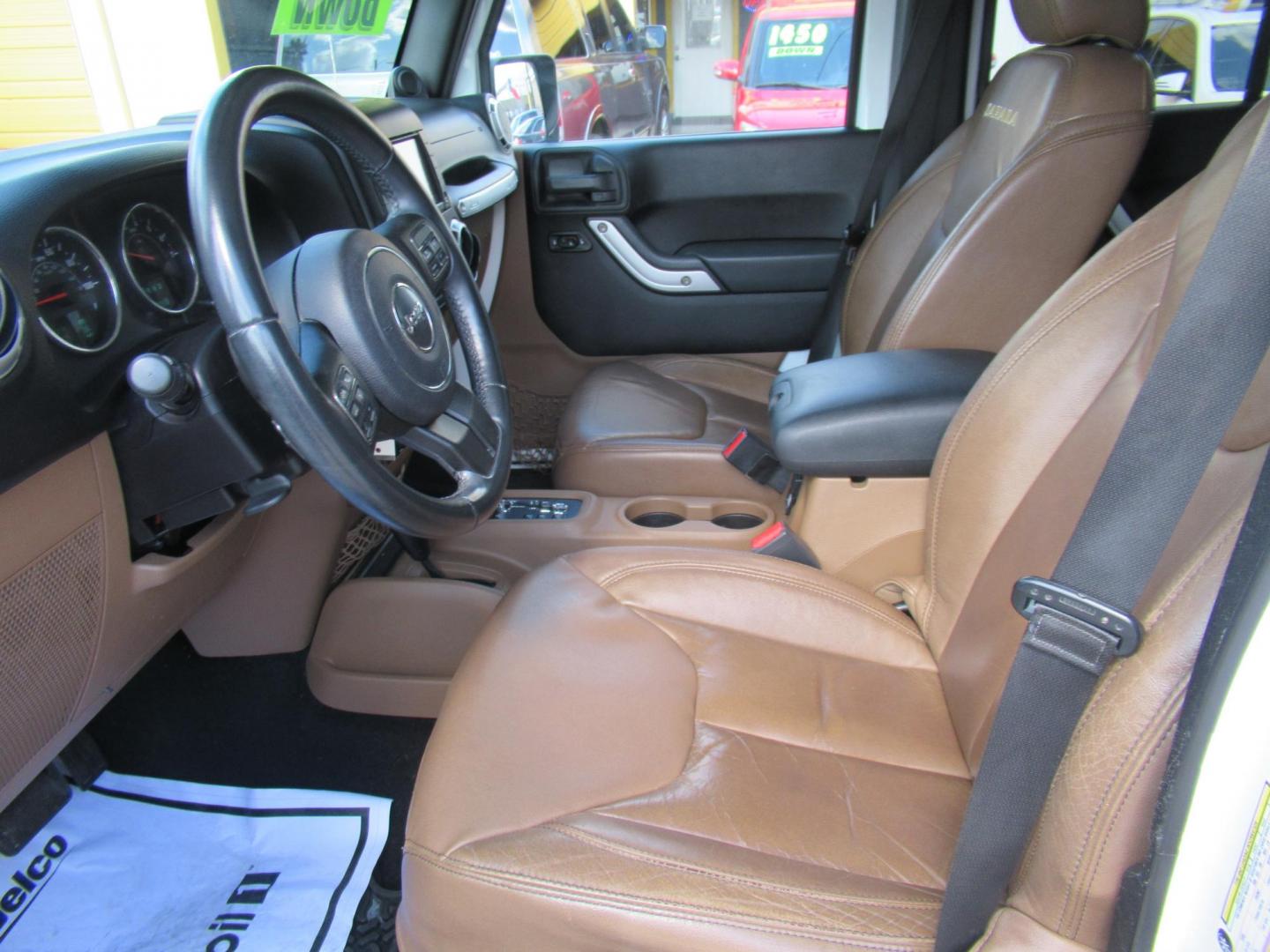 2013 White /Brown Jeep Wrangler Unlimited Sahara 4WD (1C4HJWEG7DL) with an 3.6L V6 DOHC 24V FFV engine, Automatic transmission, located at 1511 North Shepherd Dr., Houston, TX, 77008, (281) 657-1221, 29.798361, -95.412560 - 2013 JEEP WRANGLER UNLIMITED SAHARA VIN: 1C4HJWEG7DL579209 1 C 4 H J W E G 7 D L 5 7 9 2 0 9 4 DOOR WAGON/SPORT UTILITY 3.6L V6 F DOHC 24V GASOLINE REAR WHEEL DRIVE W/ 4X4 - Photo#1