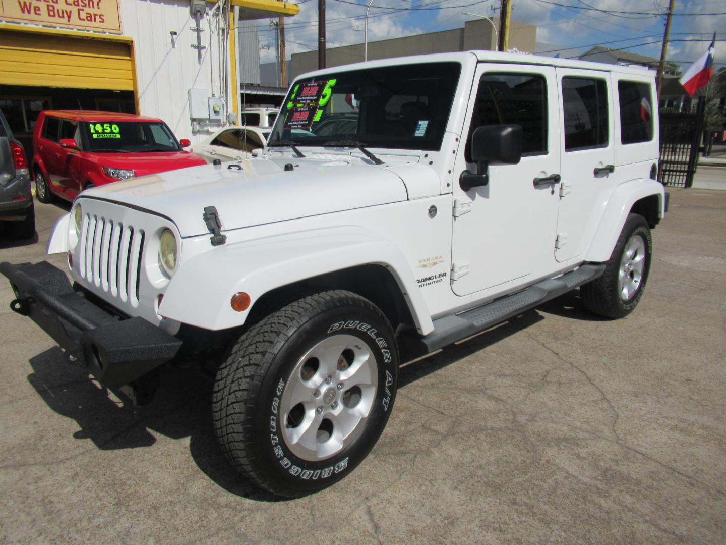 2013 White /Brown Jeep Wrangler Unlimited Sahara 4WD (1C4HJWEG7DL) with an 3.6L V6 DOHC 24V FFV engine, Automatic transmission, located at 1511 North Shepherd Dr., Houston, TX, 77008, (281) 657-1221, 29.798361, -95.412560 - 2013 JEEP WRANGLER UNLIMITED SAHARA VIN: 1C4HJWEG7DL579209 1 C 4 H J W E G 7 D L 5 7 9 2 0 9 4 DOOR WAGON/SPORT UTILITY 3.6L V6 F DOHC 24V GASOLINE REAR WHEEL DRIVE W/ 4X4 - Photo#7