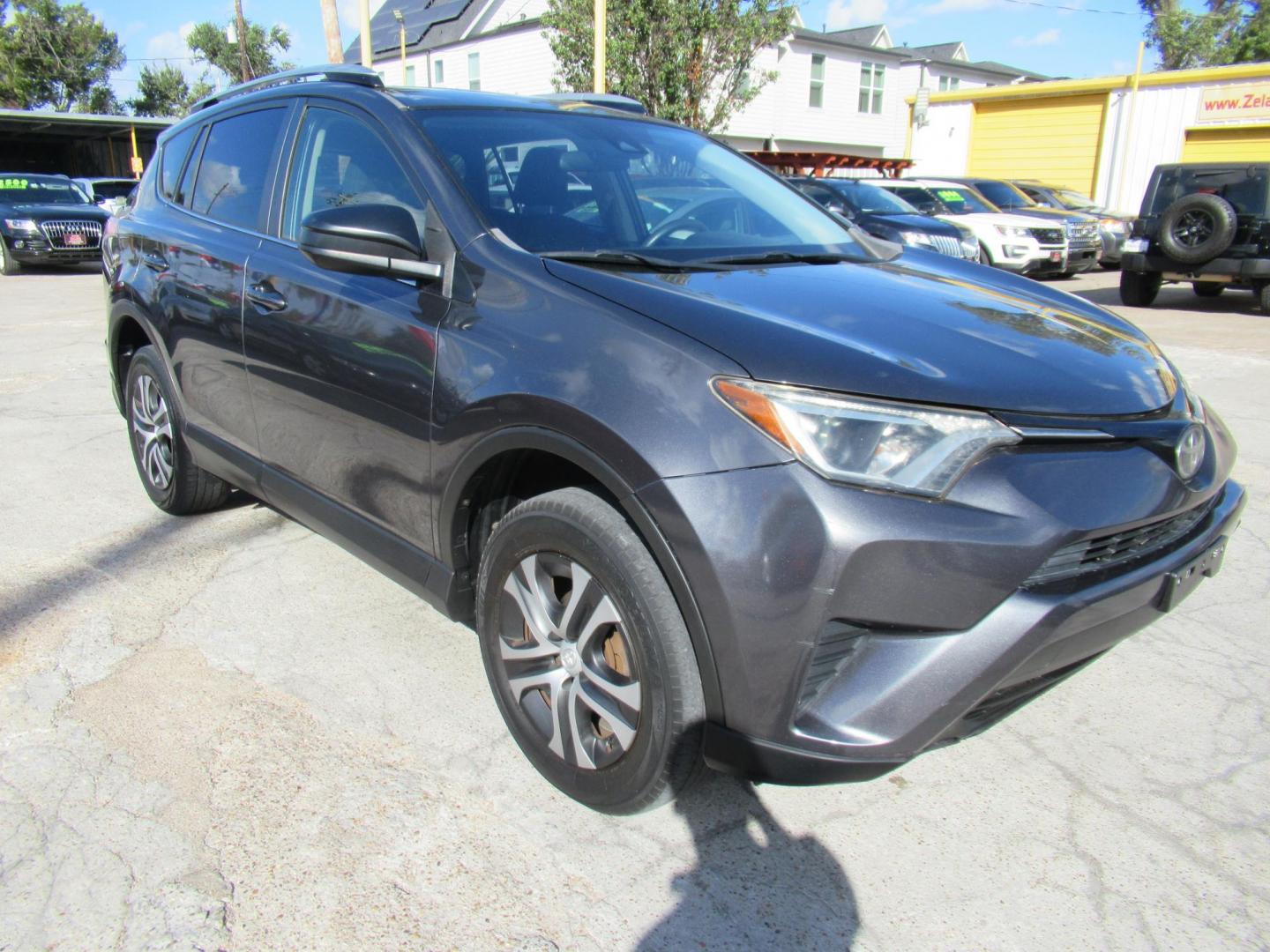 2017 Gray /Gray Toyota RAV4 LE FWD (JTMZFREV6HJ) with an 2.5L L4 DOHC 16V engine, Automatic transmission, located at 1511 North Shepherd Dr., Houston, TX, 77008, (281) 657-1221, 29.798361, -95.412560 - 2017 TOYOTA RAV4 LE VIN: JTMZFREV6HJ708046 J T M Z F R E V 6 H J 7 0 8 0 4 6 4 DOOR WAGON/SPORT UTILITY 2.5L I4 F DOHC 16V GASOLINE FRONT WHEEL DRIVE - Photo#0