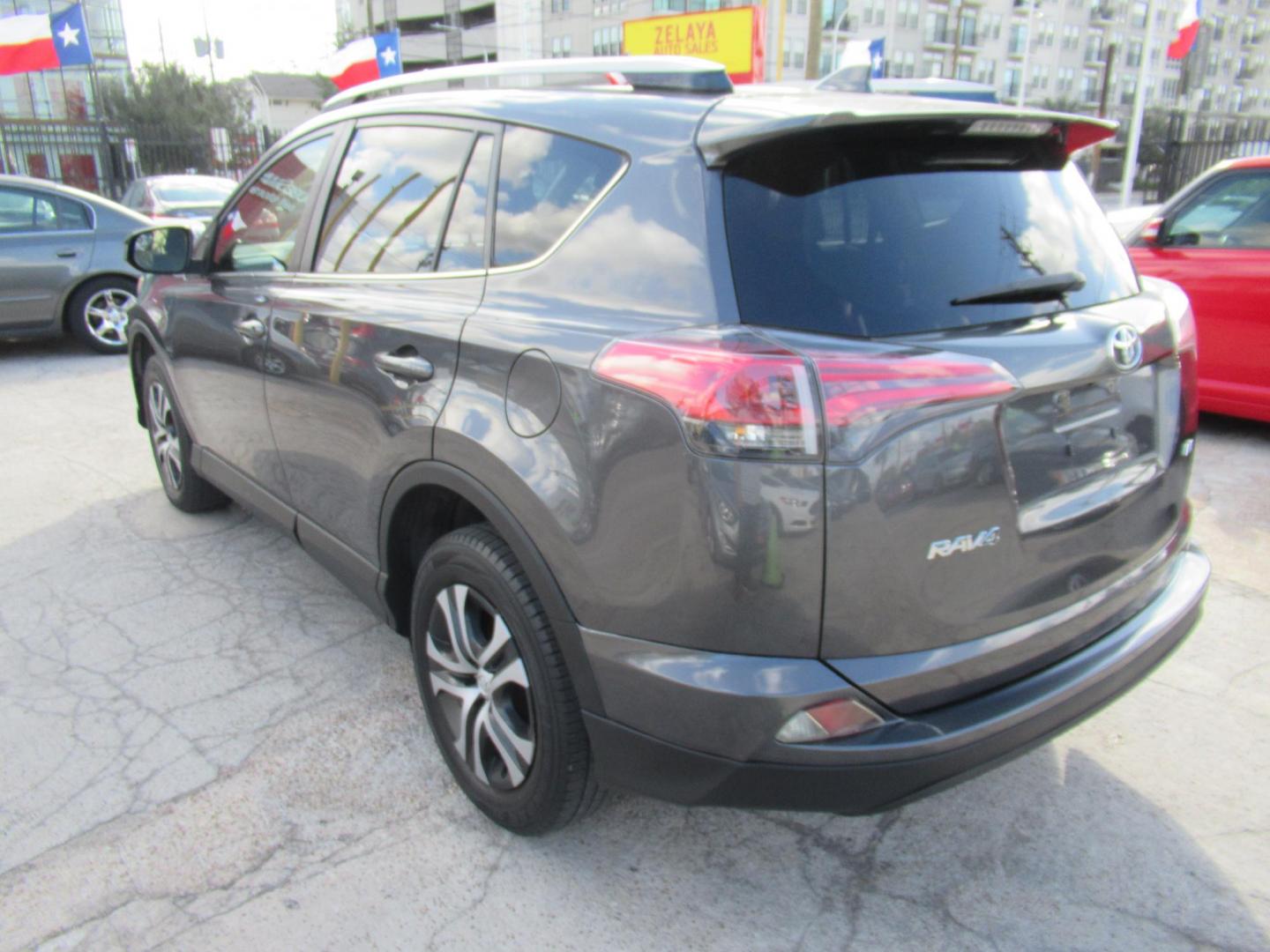 2017 Gray /Gray Toyota RAV4 LE FWD (JTMZFREV6HJ) with an 2.5L L4 DOHC 16V engine, Automatic transmission, located at 1511 North Shepherd Dr., Houston, TX, 77008, (281) 657-1221, 29.798361, -95.412560 - 2017 TOYOTA RAV4 LE VIN: JTMZFREV6HJ708046 J T M Z F R E V 6 H J 7 0 8 0 4 6 4 DOOR WAGON/SPORT UTILITY 2.5L I4 F DOHC 16V GASOLINE FRONT WHEEL DRIVE - Photo#25