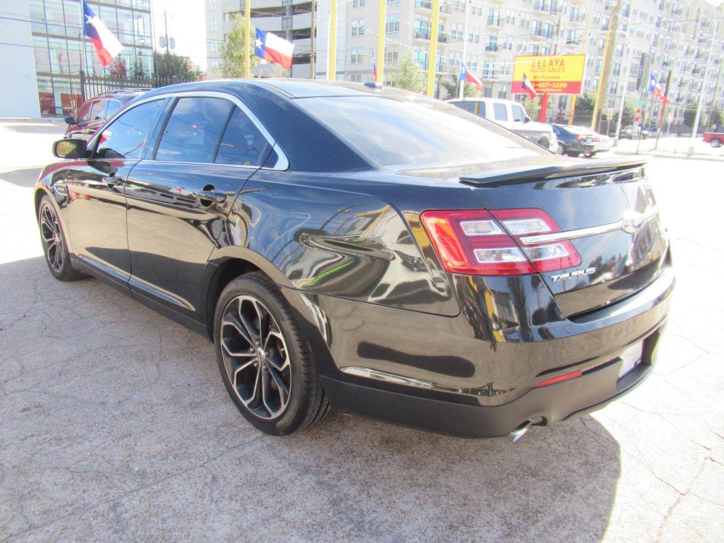 2013 Black /Black Ford Taurus SHO AWD (1FAHP2KT1DG) with an 3.5L V6 DOHC 24V engine, 6-Speed Automatic transmission, located at 1511 North Shepherd Dr., Houston, TX, 77008, (281) 657-1221, 29.798361, -95.412560 - 2013 FORD TAURUS SHO VIN: 1FAHP2KT1DG171926 1 F A H P 2 K T 1 D G 1 7 1 9 2 6 SEDAN 4 DR 3.5L V6 F DOHC 16V GASOLINE ALL WHEEL DRIVE - Photo#14