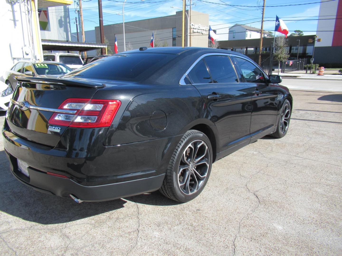 2013 Black /Black Ford Taurus SHO AWD (1FAHP2KT1DG) with an 3.5L V6 DOHC 24V engine, 6-Speed Automatic transmission, located at 1511 North Shepherd Dr., Houston, TX, 77008, (281) 657-1221, 29.798361, -95.412560 - 2013 FORD TAURUS SHO VIN: 1FAHP2KT1DG171926 1 F A H P 2 K T 1 D G 1 7 1 9 2 6 SEDAN 4 DR 3.5L V6 F DOHC 16V GASOLINE ALL WHEEL DRIVE - Photo#16