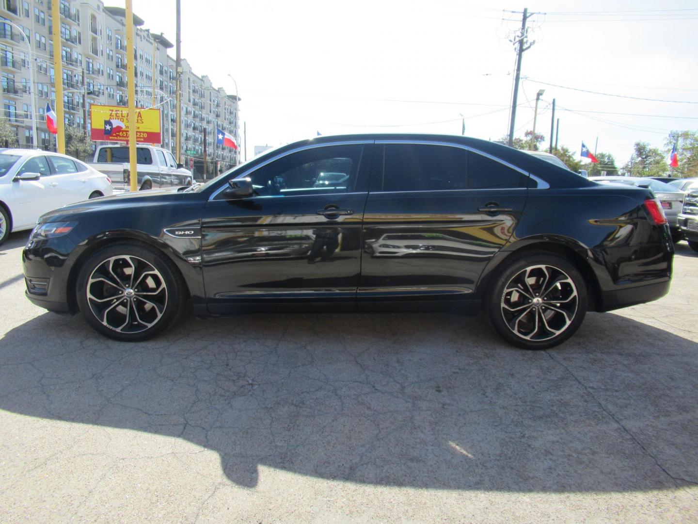 2013 Black /Black Ford Taurus SHO AWD (1FAHP2KT1DG) with an 3.5L V6 DOHC 24V engine, 6-Speed Automatic transmission, located at 1511 North Shepherd Dr., Houston, TX, 77008, (281) 657-1221, 29.798361, -95.412560 - 2013 FORD TAURUS SHO VIN: 1FAHP2KT1DG171926 1 F A H P 2 K T 1 D G 1 7 1 9 2 6 SEDAN 4 DR 3.5L V6 F DOHC 16V GASOLINE ALL WHEEL DRIVE - Photo#20