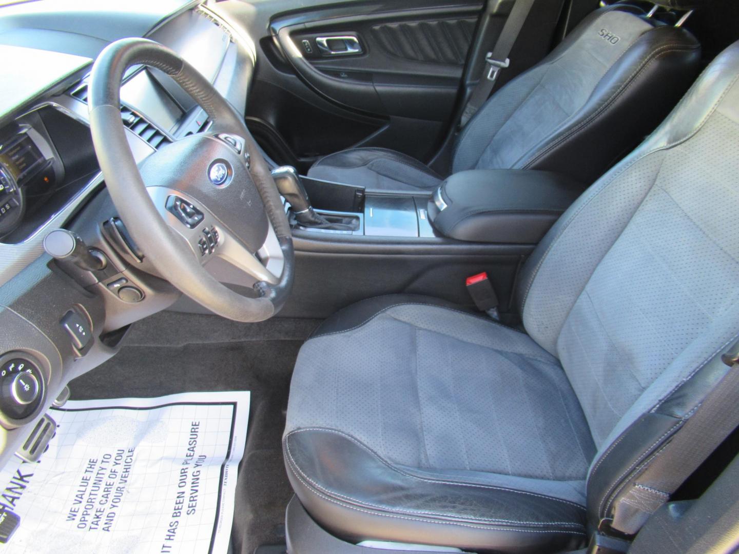 2013 Black /Black Ford Taurus SHO AWD (1FAHP2KT1DG) with an 3.5L V6 DOHC 24V engine, 6-Speed Automatic transmission, located at 1511 North Shepherd Dr., Houston, TX, 77008, (281) 657-1221, 29.798361, -95.412560 - 2013 FORD TAURUS SHO VIN: 1FAHP2KT1DG171926 1 F A H P 2 K T 1 D G 1 7 1 9 2 6 SEDAN 4 DR 3.5L V6 F DOHC 16V GASOLINE ALL WHEEL DRIVE - Photo#2