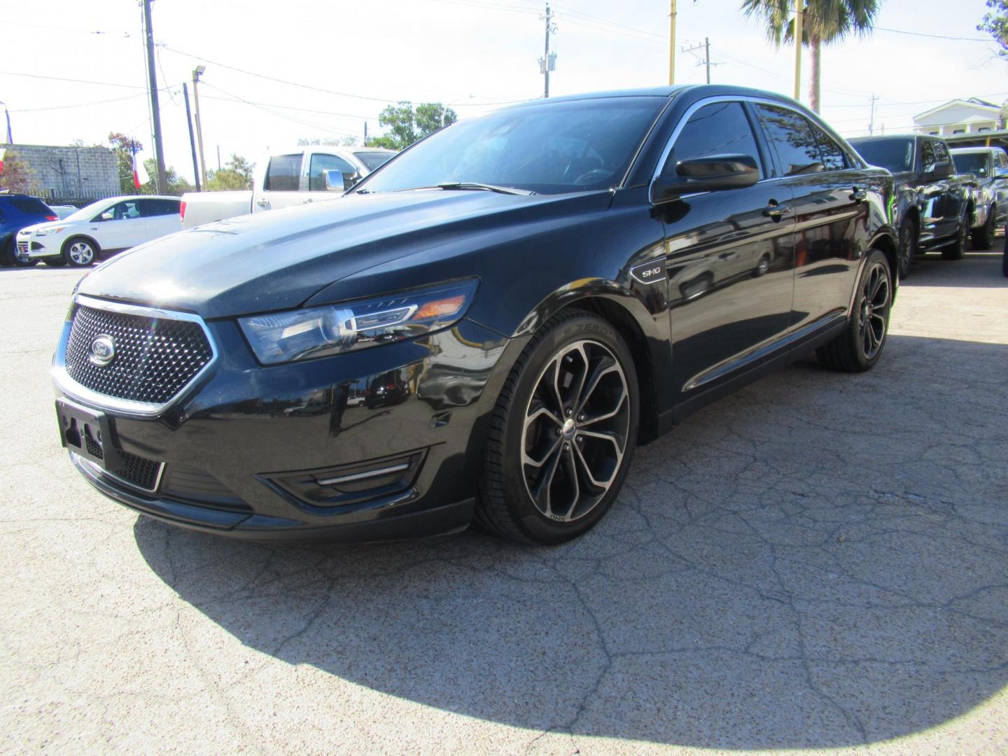 2013 Black /Black Ford Taurus SHO AWD (1FAHP2KT1DG) with an 3.5L V6 DOHC 24V engine, 6-Speed Automatic transmission, located at 1511 North Shepherd Dr., Houston, TX, 77008, (281) 657-1221, 29.798361, -95.412560 - 2013 FORD TAURUS SHO VIN: 1FAHP2KT1DG171926 1 F A H P 2 K T 1 D G 1 7 1 9 2 6 SEDAN 4 DR 3.5L V6 F DOHC 16V GASOLINE ALL WHEEL DRIVE - Photo#21