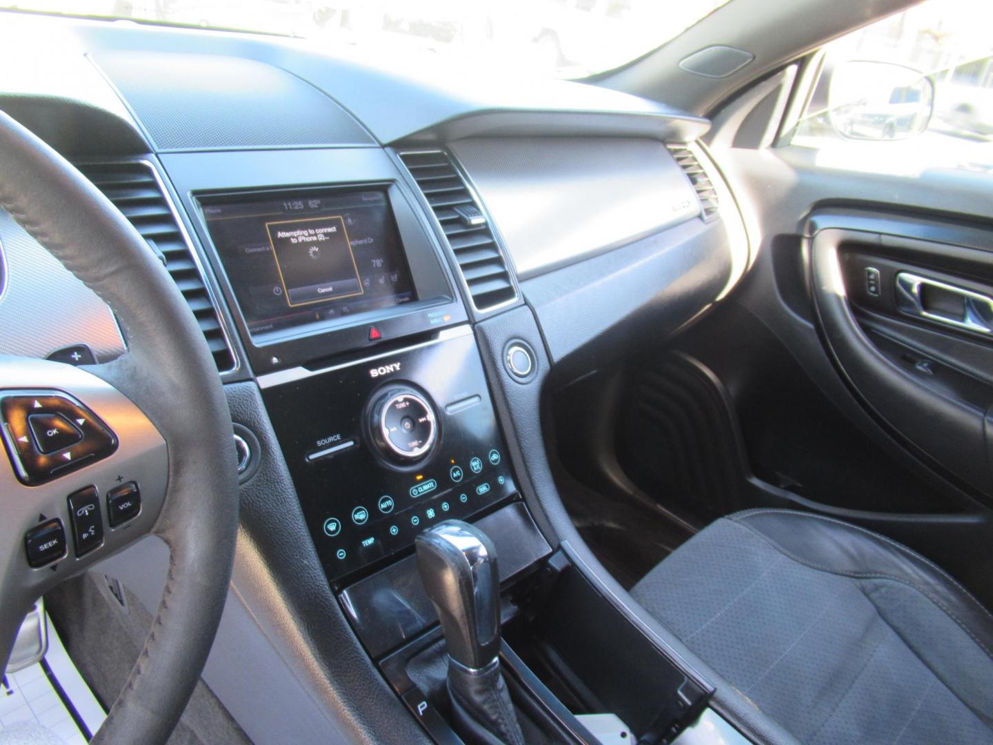 2013 Black /Black Ford Taurus SHO AWD (1FAHP2KT1DG) with an 3.5L V6 DOHC 24V engine, 6-Speed Automatic transmission, located at 1511 North Shepherd Dr., Houston, TX, 77008, (281) 657-1221, 29.798361, -95.412560 - 2013 FORD TAURUS SHO VIN: 1FAHP2KT1DG171926 1 F A H P 2 K T 1 D G 1 7 1 9 2 6 SEDAN 4 DR 3.5L V6 F DOHC 16V GASOLINE ALL WHEEL DRIVE - Photo#4