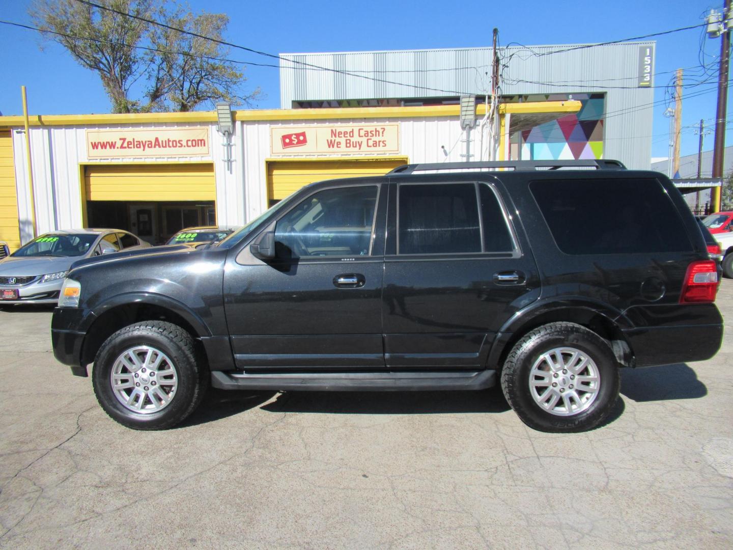 2013 Black /Tan Ford Expedition 2WD (1FMJU1H53DE) with an 5.4L V8 SOHC 16V FFV engine, Automatic transmission, located at 1511 North Shepherd Dr., Houston, TX, 77008, (281) 657-1221, 29.798361, -95.412560 - 2013 FORD EXPEDITION XLT VIN: 1FMJU1H53DEF31504 1 F M J U 1 H 5 3 D E F 3 1 5 0 4 4 DOOR WAGON/SPORT UTILITY 5.4L V8 F SOHC 24V FLEX FUEL REAR WHEEL DRIVE - Photo#0