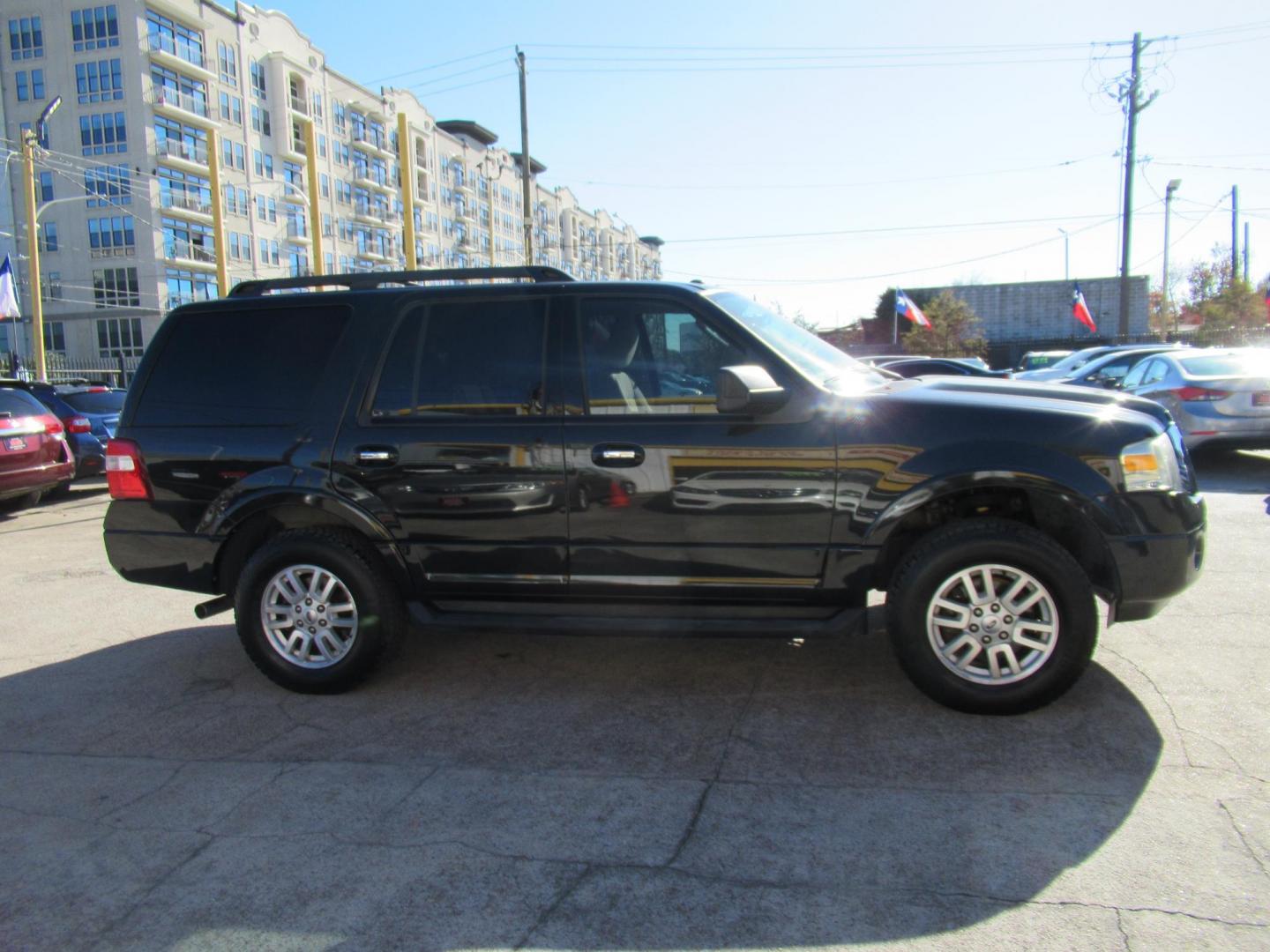 2013 Black /Tan Ford Expedition 2WD (1FMJU1H53DE) with an 5.4L V8 SOHC 16V FFV engine, Automatic transmission, located at 1511 North Shepherd Dr., Houston, TX, 77008, (281) 657-1221, 29.798361, -95.412560 - 2013 FORD EXPEDITION XLT VIN: 1FMJU1H53DEF31504 1 F M J U 1 H 5 3 D E F 3 1 5 0 4 4 DOOR WAGON/SPORT UTILITY 5.4L V8 F SOHC 24V FLEX FUEL REAR WHEEL DRIVE - Photo#23