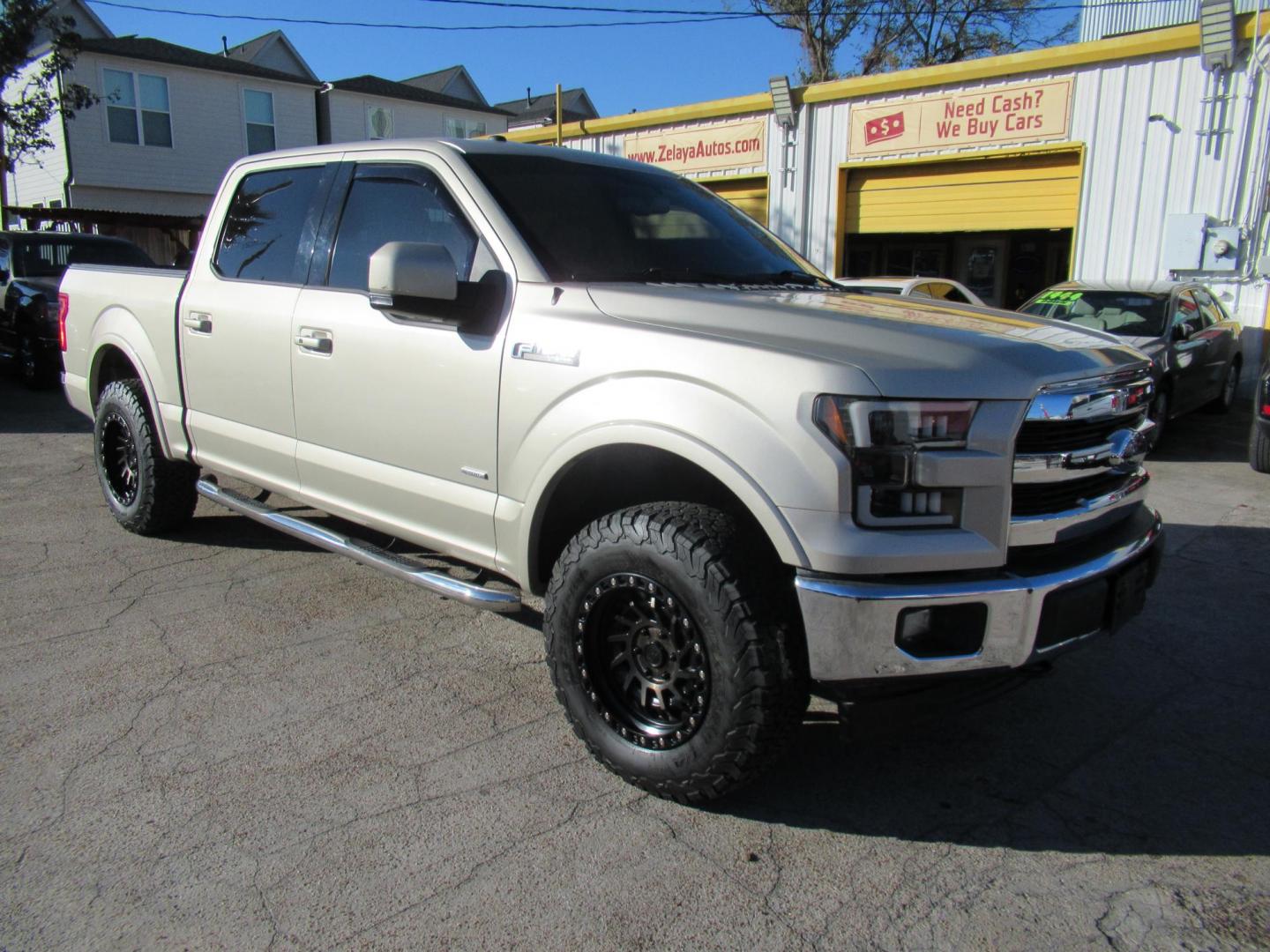 2017 Gold /Tan Ford F-150 Lariat SuperCrew 5.5-ft. Bed 4WD (1FTEW1EP6HF) with an 2.7L V6 DOHC 24V engine, Automatic transmission, located at 1511 North Shepherd Dr., Houston, TX, 77008, (281) 657-1221, 29.798361, -95.412560 - 2017 FORD F-150 LARIAT VIN: 1FTEW1EP6HFC50593 1 F T E W 1 E P 6 H F C 5 0 5 9 3 CREW PICKUP 2.7L V6 F DOHC 24V GASOLINE REAR WHEEL DRIVE W/ 4X4 - Photo#21