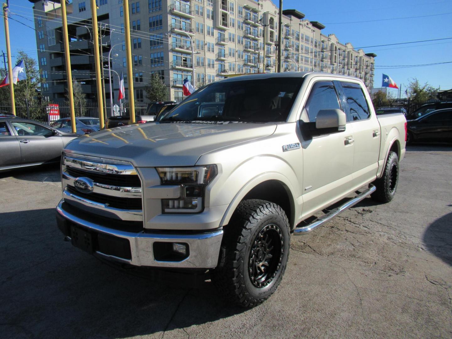 2017 Gold /Tan Ford F-150 Lariat SuperCrew 5.5-ft. Bed 4WD (1FTEW1EP6HF) with an 2.7L V6 DOHC 24V engine, Automatic transmission, located at 1511 North Shepherd Dr., Houston, TX, 77008, (281) 657-1221, 29.798361, -95.412560 - 2017 FORD F-150 LARIAT VIN: 1FTEW1EP6HFC50593 1 F T E W 1 E P 6 H F C 5 0 5 9 3 CREW PICKUP 2.7L V6 F DOHC 24V GASOLINE REAR WHEEL DRIVE W/ 4X4 - Photo#26