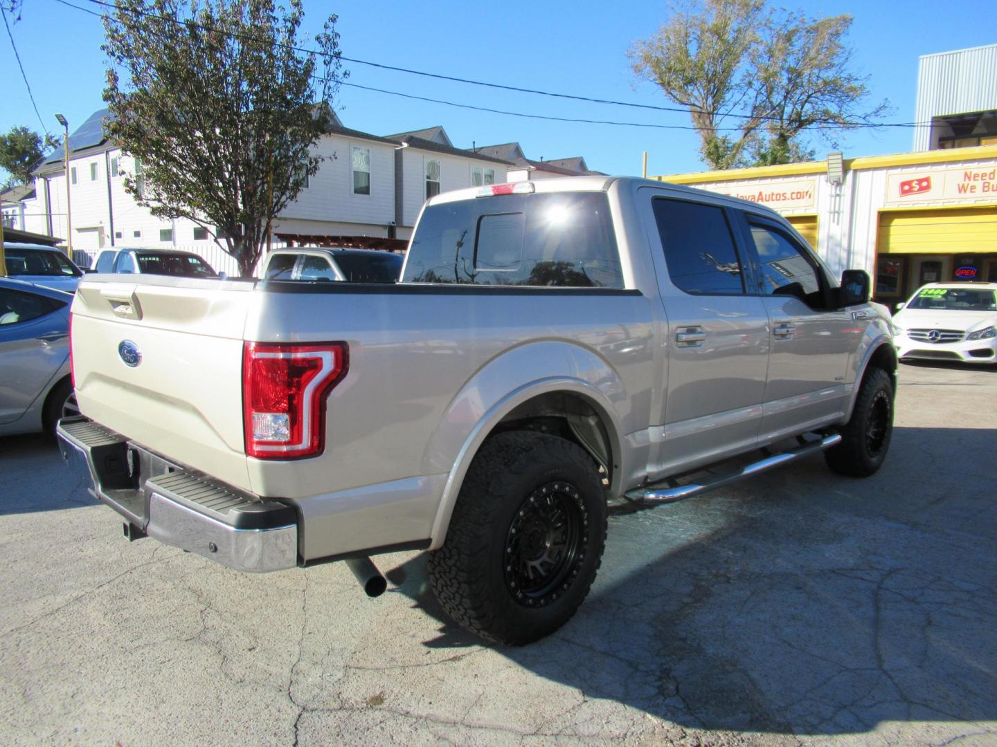 2017 Gold /Tan Ford F-150 Lariat SuperCrew 5.5-ft. Bed 4WD (1FTEW1EP6HF) with an 2.7L V6 DOHC 24V engine, Automatic transmission, located at 1511 North Shepherd Dr., Houston, TX, 77008, (281) 657-1221, 29.798361, -95.412560 - 2017 FORD F-150 LARIAT VIN: 1FTEW1EP6HFC50593 1 F T E W 1 E P 6 H F C 5 0 5 9 3 CREW PICKUP 2.7L V6 F DOHC 24V GASOLINE REAR WHEEL DRIVE W/ 4X4 - Photo#27