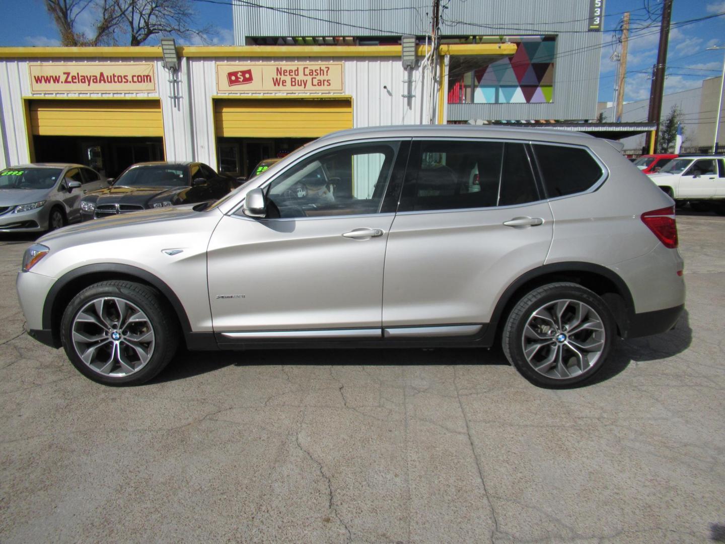 2015 Gold /Brown BMW X3 xDrive28i (5UXWX9C51F0) with an 2.0L L4 DOHC 16V engine, 8-Speed Automatic transmission, located at 1511 North Shepherd Dr., Houston, TX, 77008, (281) 657-1221, 29.798361, -95.412560 - 2015 BMW X3 XDRIVE28I VIN: 5UXWX9C51F0D52208 5 U X W X 9 C 5 1 F 0 D 5 2 2 0 8 4 DOOR WAGON/SPORT UTILITY 2.0L I4 F DOHC 16V GASOLINE ALL WHEEL DRIVE - Photo#0