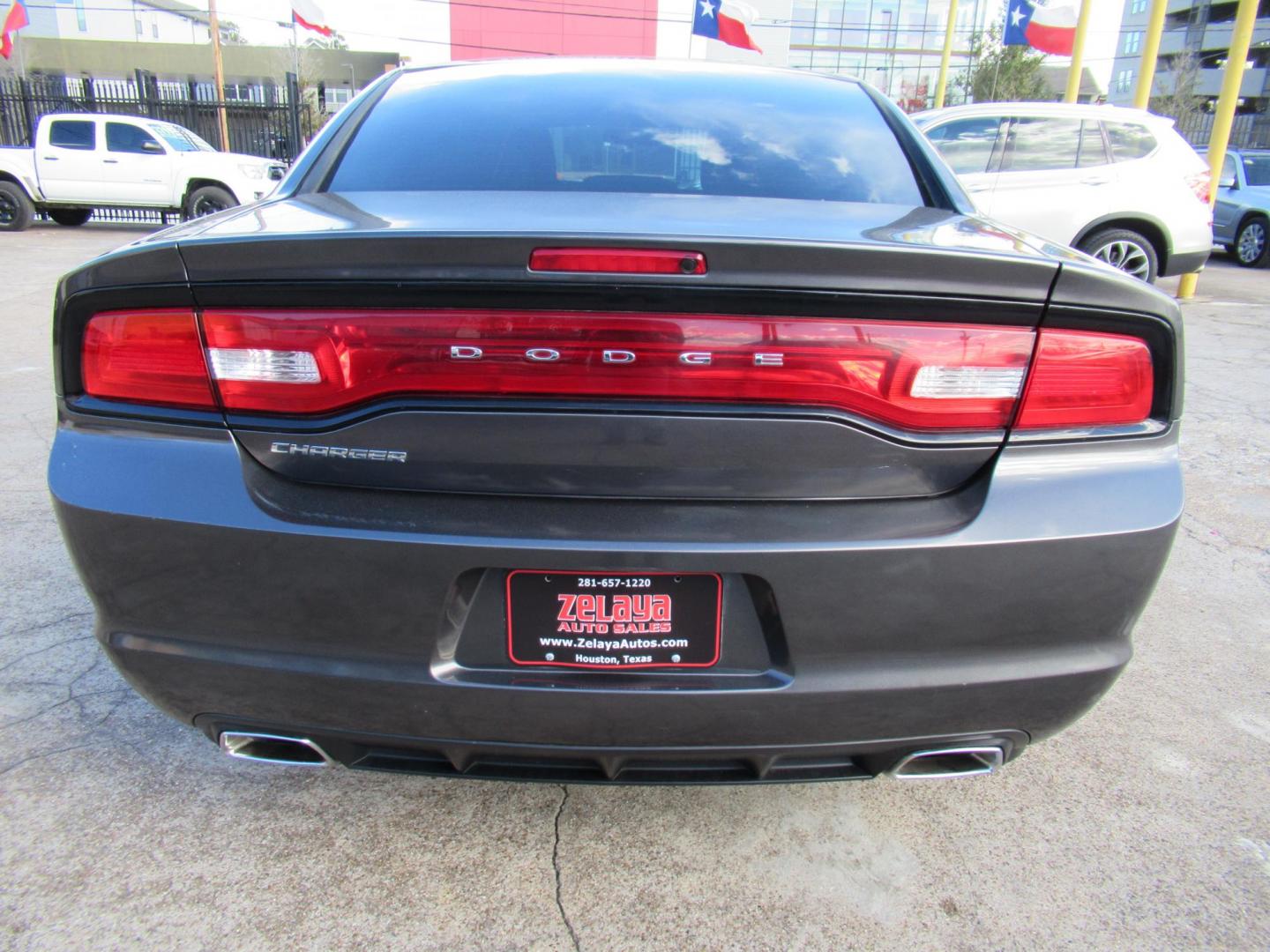 2014 Gray /Black Dodge Charger SE (2C3CDXBG0EH) with an 3.6L V6 DOHC 24V engine, 5-Speed Automatic transmission, located at 1511 North Shepherd Dr., Houston, TX, 77008, (281) 657-1221, 29.798361, -95.412560 - 2014 DODGE CHARGER SE VIN: 2C3CDXBG0EH188840 2 C 3 C D X B G 0 E H 1 8 8 8 4 0 SEDAN 4 DR 3.6L V6 F DOHC 24V GASOLINE REAR WHEEL DRIVE - Photo#14