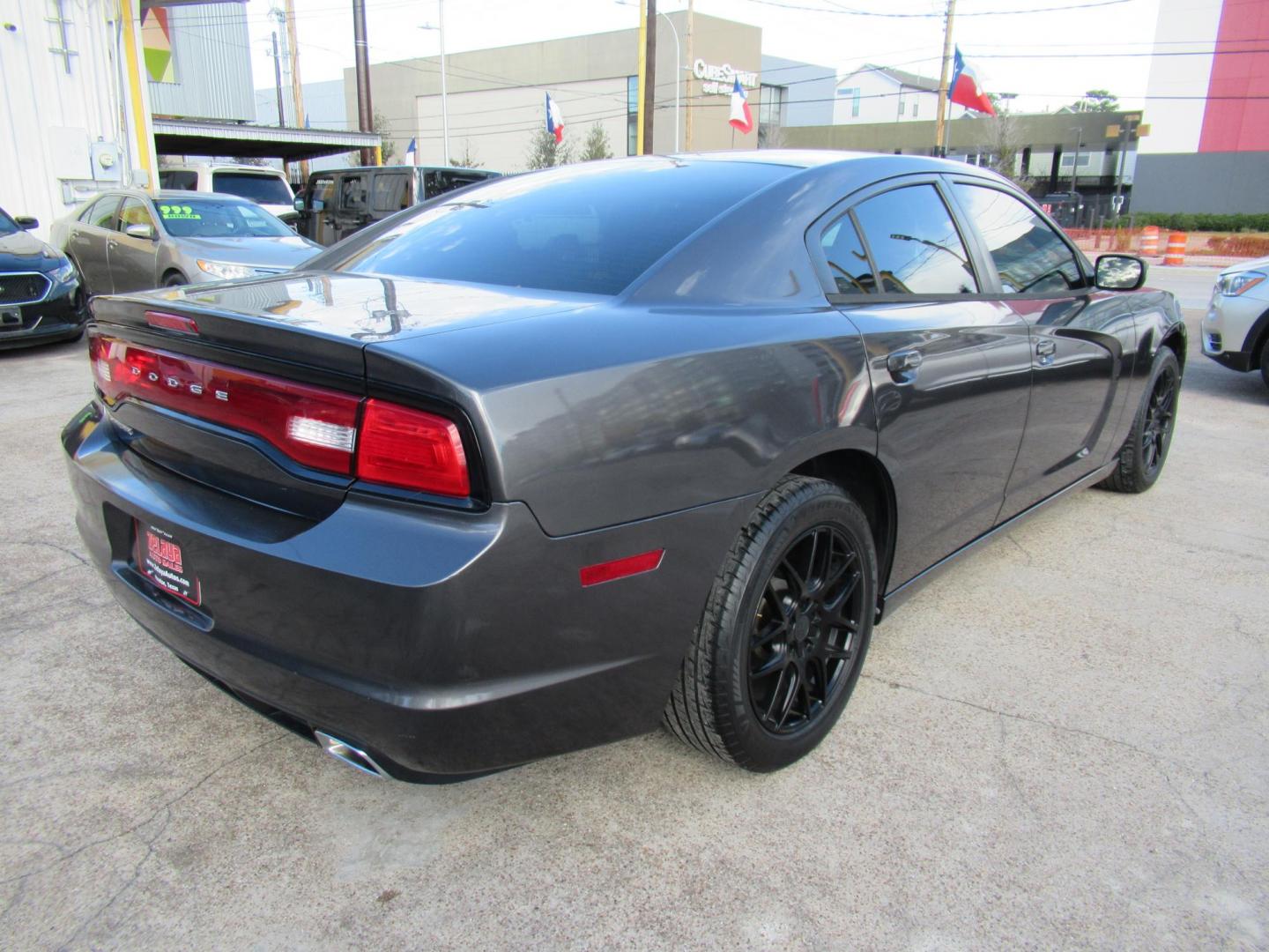 2014 Gray /Black Dodge Charger SE (2C3CDXBG0EH) with an 3.6L V6 DOHC 24V engine, 5-Speed Automatic transmission, located at 1511 North Shepherd Dr., Houston, TX, 77008, (281) 657-1221, 29.798361, -95.412560 - 2014 DODGE CHARGER SE VIN: 2C3CDXBG0EH188840 2 C 3 C D X B G 0 E H 1 8 8 8 4 0 SEDAN 4 DR 3.6L V6 F DOHC 24V GASOLINE REAR WHEEL DRIVE - Photo#15