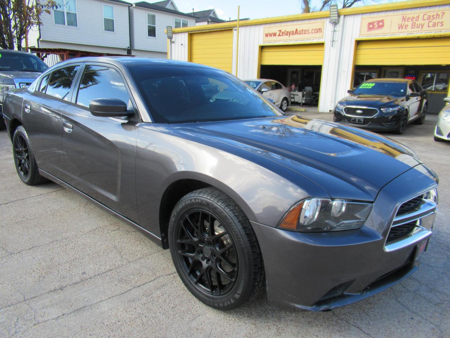 2014 Gray /Black Dodge Charger SE (2C3CDXBG0EH) with an 3.6L V6 DOHC 24V engine, 5-Speed Automatic transmission, located at 1511 North Shepherd Dr., Houston, TX, 77008, (281) 657-1221, 29.798361, -95.412560 - 2014 DODGE CHARGER SE VIN: 2C3CDXBG0EH188840 2 C 3 C D X B G 0 E H 1 8 8 8 4 0 SEDAN 4 DR 3.6L V6 F DOHC 24V GASOLINE REAR WHEEL DRIVE - Photo#17