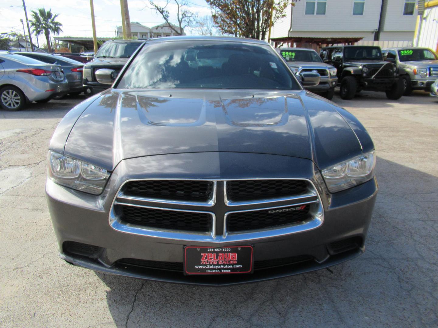 2014 Gray /Black Dodge Charger SE (2C3CDXBG0EH) with an 3.6L V6 DOHC 24V engine, 5-Speed Automatic transmission, located at 1511 North Shepherd Dr., Houston, TX, 77008, (281) 657-1221, 29.798361, -95.412560 - 2014 DODGE CHARGER SE VIN: 2C3CDXBG0EH188840 2 C 3 C D X B G 0 E H 1 8 8 8 4 0 SEDAN 4 DR 3.6L V6 F DOHC 24V GASOLINE REAR WHEEL DRIVE - Photo#20