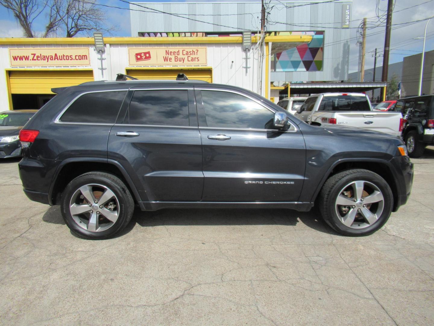 2015 Gray /Black Jeep Grand Cherokee Overland 4WD (1C4RJFCG6FC) with an 3.6L V6 DOHC 24V engine, Automatic transmission, located at 1511 North Shepherd Dr., Houston, TX, 77008, (281) 657-1221, 29.798361, -95.412560 - 2015 JEEP GRAND CHEROKEE OVERLAND VIN: 1C4RJFCG6FC244212 1 C 4 R J F C G 6 F C 2 4 4 2 1 2 4 DOOR WAGON/SPORT UTILITY 3.6L V6 F DOHC 24V GASOLINE REAR WHEEL DRIVE W/ 4X4 - Photo#0