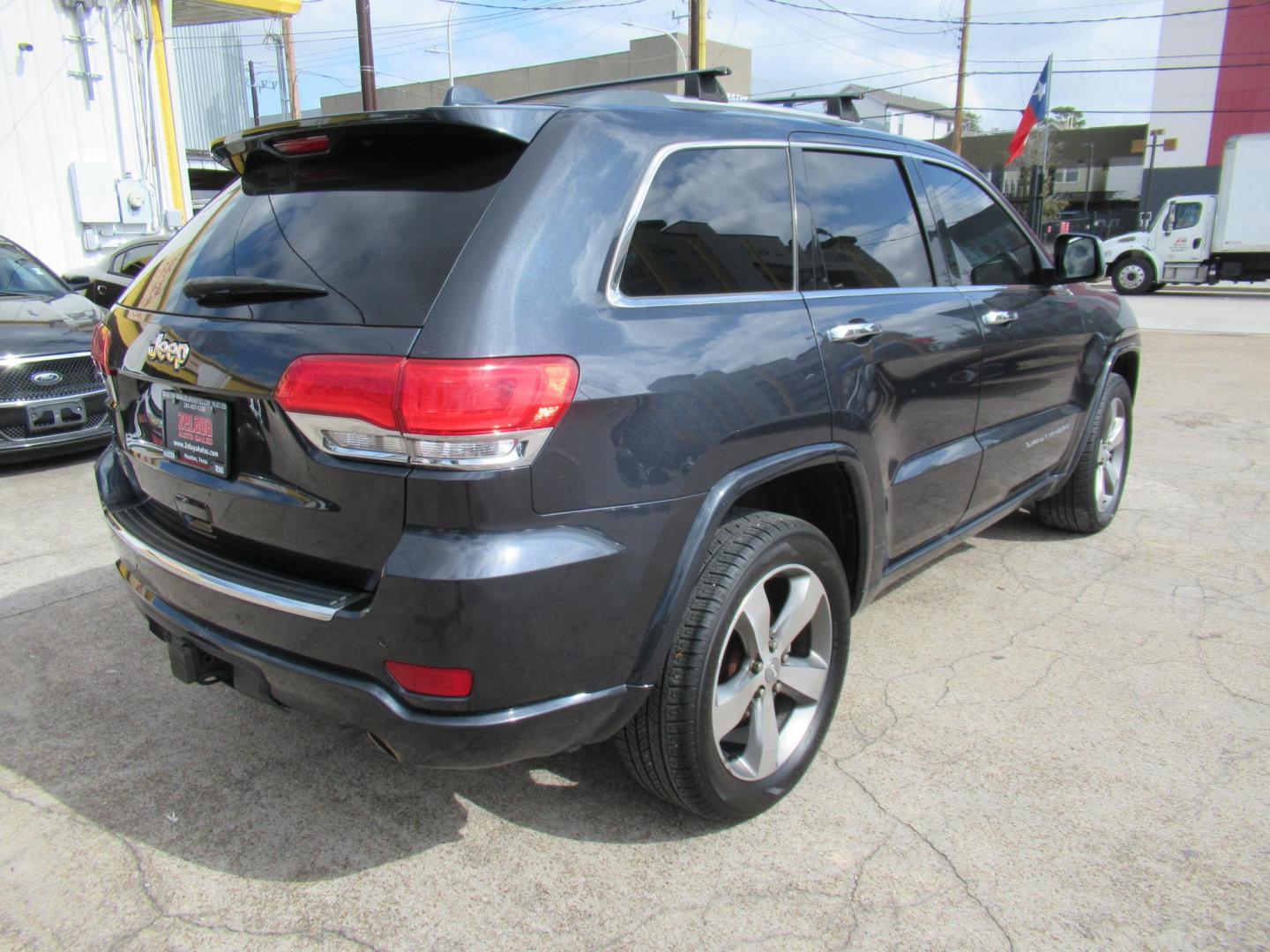 2015 Gray /Black Jeep Grand Cherokee Overland 4WD (1C4RJFCG6FC) with an 3.6L V6 DOHC 24V engine, Automatic transmission, located at 1511 North Shepherd Dr., Houston, TX, 77008, (281) 657-1221, 29.798361, -95.412560 - 2015 JEEP GRAND CHEROKEE OVERLAND VIN: 1C4RJFCG6FC244212 1 C 4 R J F C G 6 F C 2 4 4 2 1 2 4 DOOR WAGON/SPORT UTILITY 3.6L V6 F DOHC 24V GASOLINE REAR WHEEL DRIVE W/ 4X4 - Photo#16