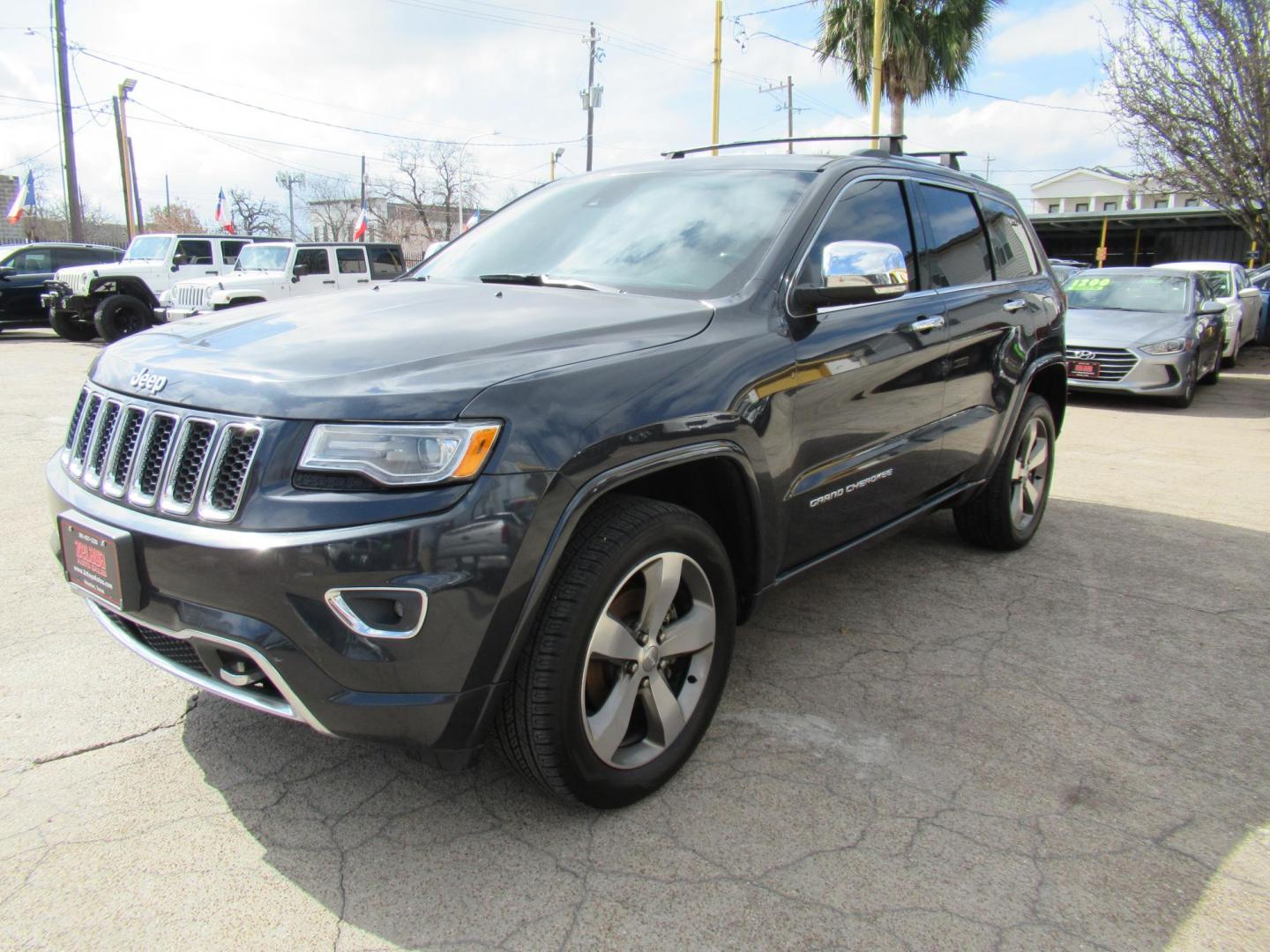 2015 Gray /Black Jeep Grand Cherokee Overland 4WD (1C4RJFCG6FC) with an 3.6L V6 DOHC 24V engine, Automatic transmission, located at 1511 North Shepherd Dr., Houston, TX, 77008, (281) 657-1221, 29.798361, -95.412560 - 2015 JEEP GRAND CHEROKEE OVERLAND VIN: 1C4RJFCG6FC244212 1 C 4 R J F C G 6 F C 2 4 4 2 1 2 4 DOOR WAGON/SPORT UTILITY 3.6L V6 F DOHC 24V GASOLINE REAR WHEEL DRIVE W/ 4X4 - Photo#19