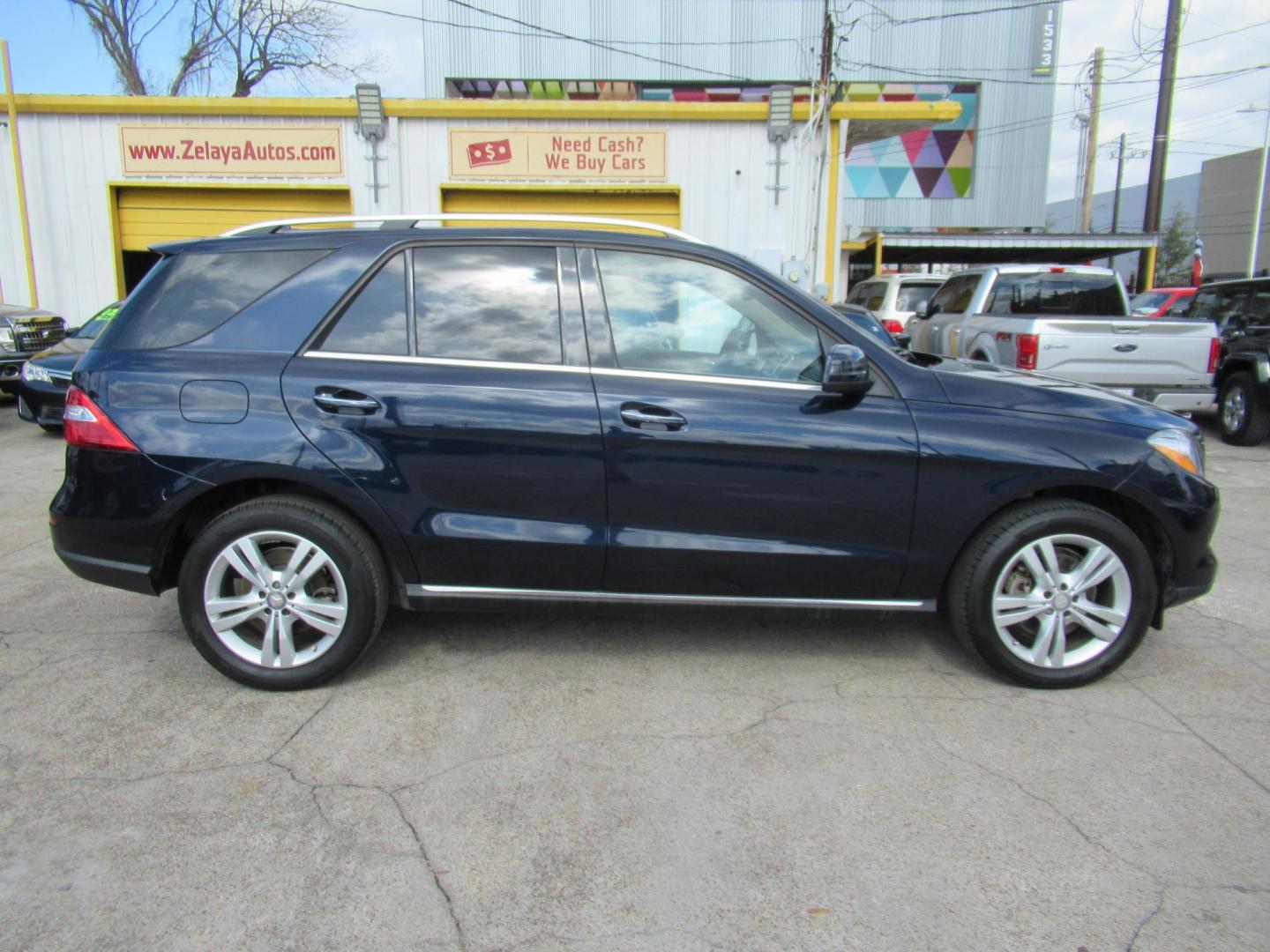 2015 Blue /Tan Mercedes-Benz M-Class ML350 (4JGDA5JB7FA) with an 3.5L V6 DOHC 24V engine, Automatic transmission, located at 1511 North Shepherd Dr., Houston, TX, 77008, (281) 657-1221, 29.798361, -95.412560 - 2015 MERCEDES-BENZ M-CLASS ML 350 VIN: 4JGDA5JB7FA454529 4 J G D A 5 J B 7 F A 4 5 4 5 2 9 4 DOOR WAGON/SPORT UTILITY 3.5L V6 F DOHC 24V GASOLINE REAR WHEEL DRIVE - Photo#30