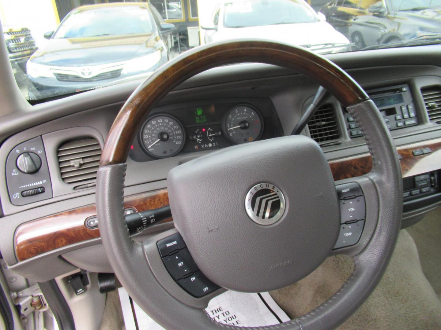 2010 Silver /Tan Mercury Grand Marquis LS (2MEBM7FV9AX) with an 4.6L V8 OHC 16V FFV engine, Automatic transmission, located at 1511 North Shepherd Dr., Houston, TX, 77008, (281) 657-1221, 29.798361, -95.412560 - 2010 MERCURY GRAND MARQUIS LS VIN: 2MEBM7FV9AX612384 2 M E B M 7 F V 9 A X 6 1 2 3 8 4 SEDAN 4 DR 4.6L V8 F SOHC 16V FLEX FUEL REAR WHEEL DRIVE - Photo#2