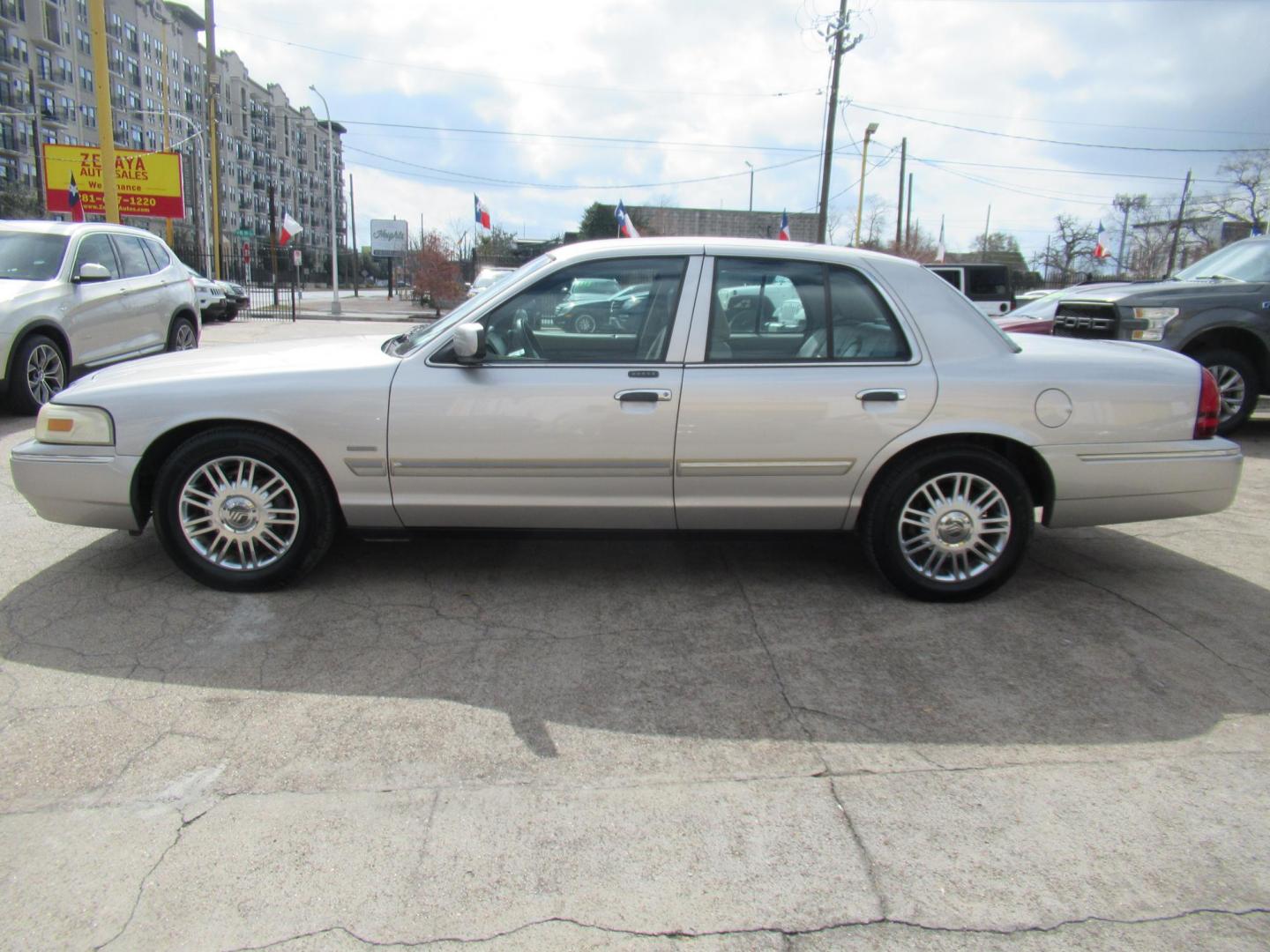 2010 Silver /Tan Mercury Grand Marquis LS (2MEBM7FV9AX) with an 4.6L V8 OHC 16V FFV engine, Automatic transmission, located at 1511 North Shepherd Dr., Houston, TX, 77008, (281) 657-1221, 29.798361, -95.412560 - 2010 MERCURY GRAND MARQUIS LS VIN: 2MEBM7FV9AX612384 2 M E B M 7 F V 9 A X 6 1 2 3 8 4 SEDAN 4 DR 4.6L V8 F SOHC 16V FLEX FUEL REAR WHEEL DRIVE - Photo#24