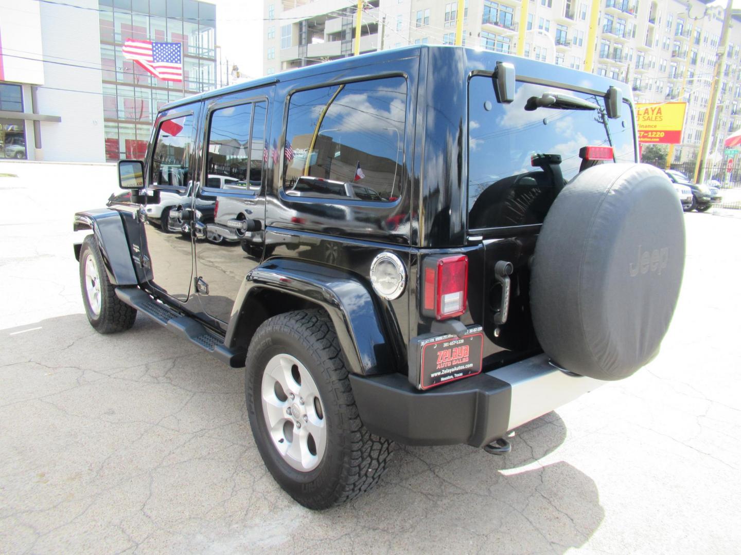 2015 Black /Black Jeep Wrangler Unlimited Sahara 4WD (1C4BJWEG8FL) with an 3.6L V6 DOHC 24V FFV engine, located at 1511 North Shepherd Dr., Houston, TX, 77008, (281) 657-1221, 29.798361, -95.412560 - 2015 JEEP WRANGLER UNLIMITED SAHARA VIN: 1C4BJWEG8FL723147 1 C 4 B J W E G 8 F L 7 2 3 1 4 7 4 DOOR WAGON/SPORT UTILITY 3.6L V6 F DOHC 24V GASOLINE REAR WHEEL DRIVE W/ 4X4 - Photo#15