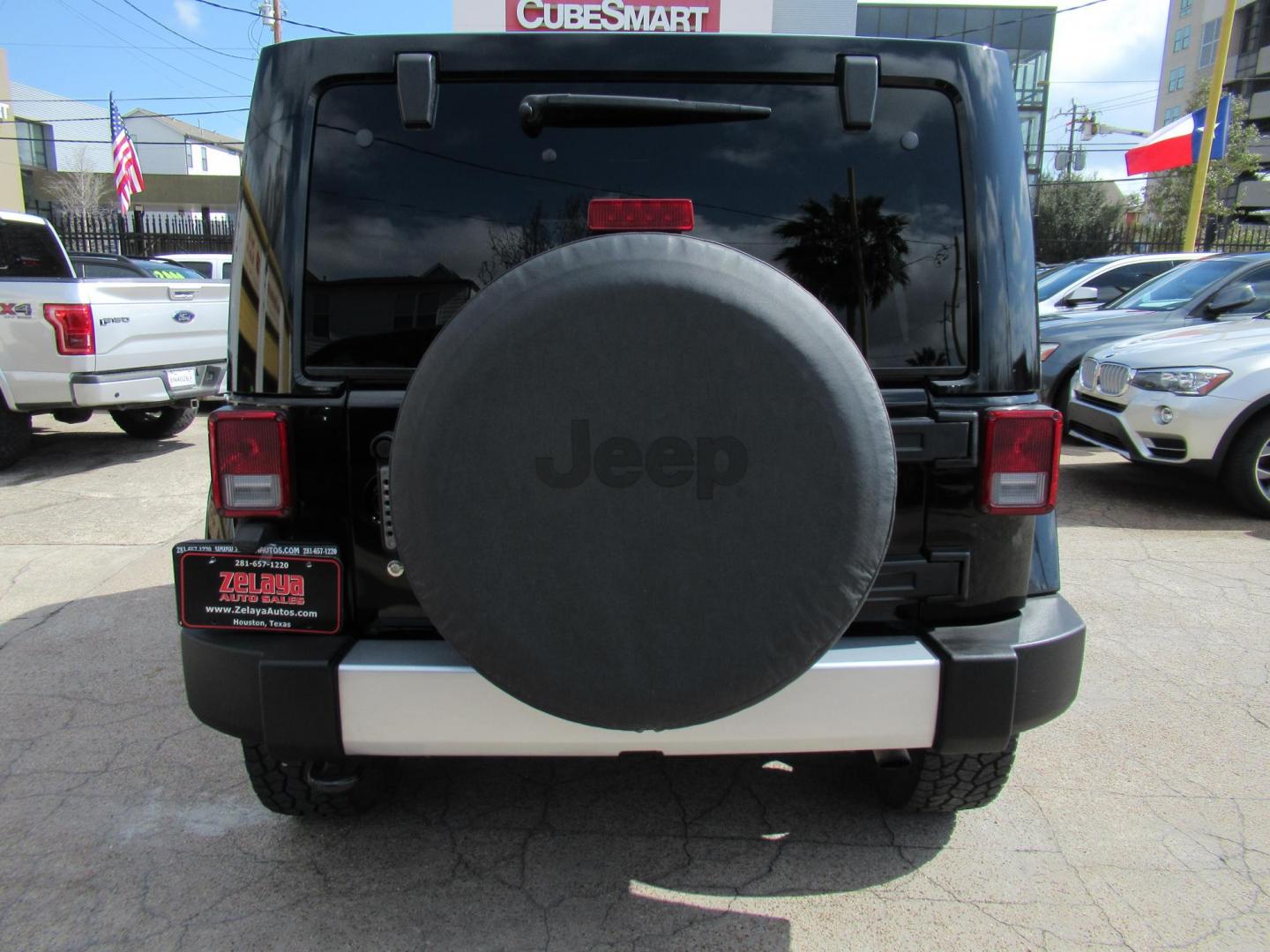 2015 Black /Black Jeep Wrangler Unlimited Sahara 4WD (1C4BJWEG8FL) with an 3.6L V6 DOHC 24V FFV engine, located at 1511 North Shepherd Dr., Houston, TX, 77008, (281) 657-1221, 29.798361, -95.412560 - 2015 JEEP WRANGLER UNLIMITED SAHARA VIN: 1C4BJWEG8FL723147 1 C 4 B J W E G 8 F L 7 2 3 1 4 7 4 DOOR WAGON/SPORT UTILITY 3.6L V6 F DOHC 24V GASOLINE REAR WHEEL DRIVE W/ 4X4 - Photo#16