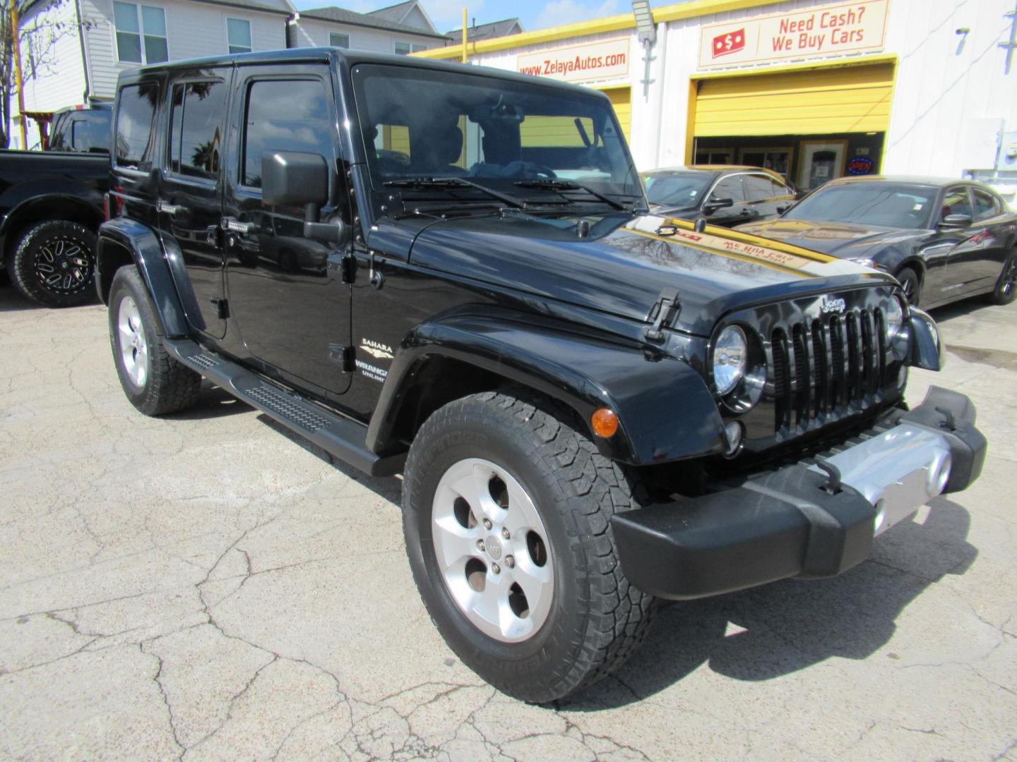 2015 Black /Black Jeep Wrangler Unlimited Sahara 4WD (1C4BJWEG8FL) with an 3.6L V6 DOHC 24V FFV engine, located at 1511 North Shepherd Dr., Houston, TX, 77008, (281) 657-1221, 29.798361, -95.412560 - 2015 JEEP WRANGLER UNLIMITED SAHARA VIN: 1C4BJWEG8FL723147 1 C 4 B J W E G 8 F L 7 2 3 1 4 7 4 DOOR WAGON/SPORT UTILITY 3.6L V6 F DOHC 24V GASOLINE REAR WHEEL DRIVE W/ 4X4 - Photo#19