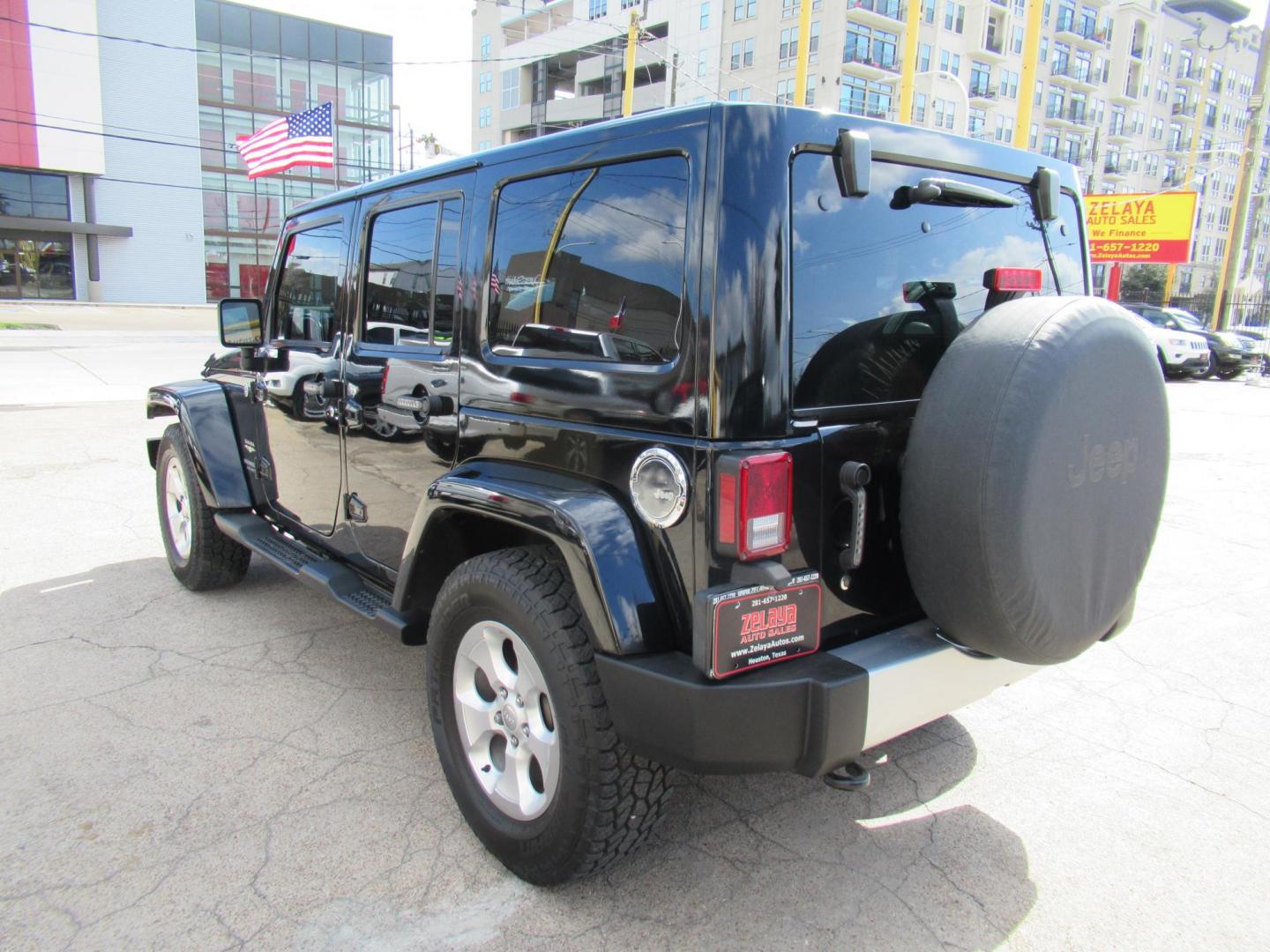 2015 Black /Black Jeep Wrangler Unlimited Sahara 4WD (1C4BJWEG8FL) with an 3.6L V6 DOHC 24V FFV engine, located at 1511 North Shepherd Dr., Houston, TX, 77008, (281) 657-1221, 29.798361, -95.412560 - 2015 JEEP WRANGLER UNLIMITED SAHARA VIN: 1C4BJWEG8FL723147 1 C 4 B J W E G 8 F L 7 2 3 1 4 7 4 DOOR WAGON/SPORT UTILITY 3.6L V6 F DOHC 24V GASOLINE REAR WHEEL DRIVE W/ 4X4 - Photo#23